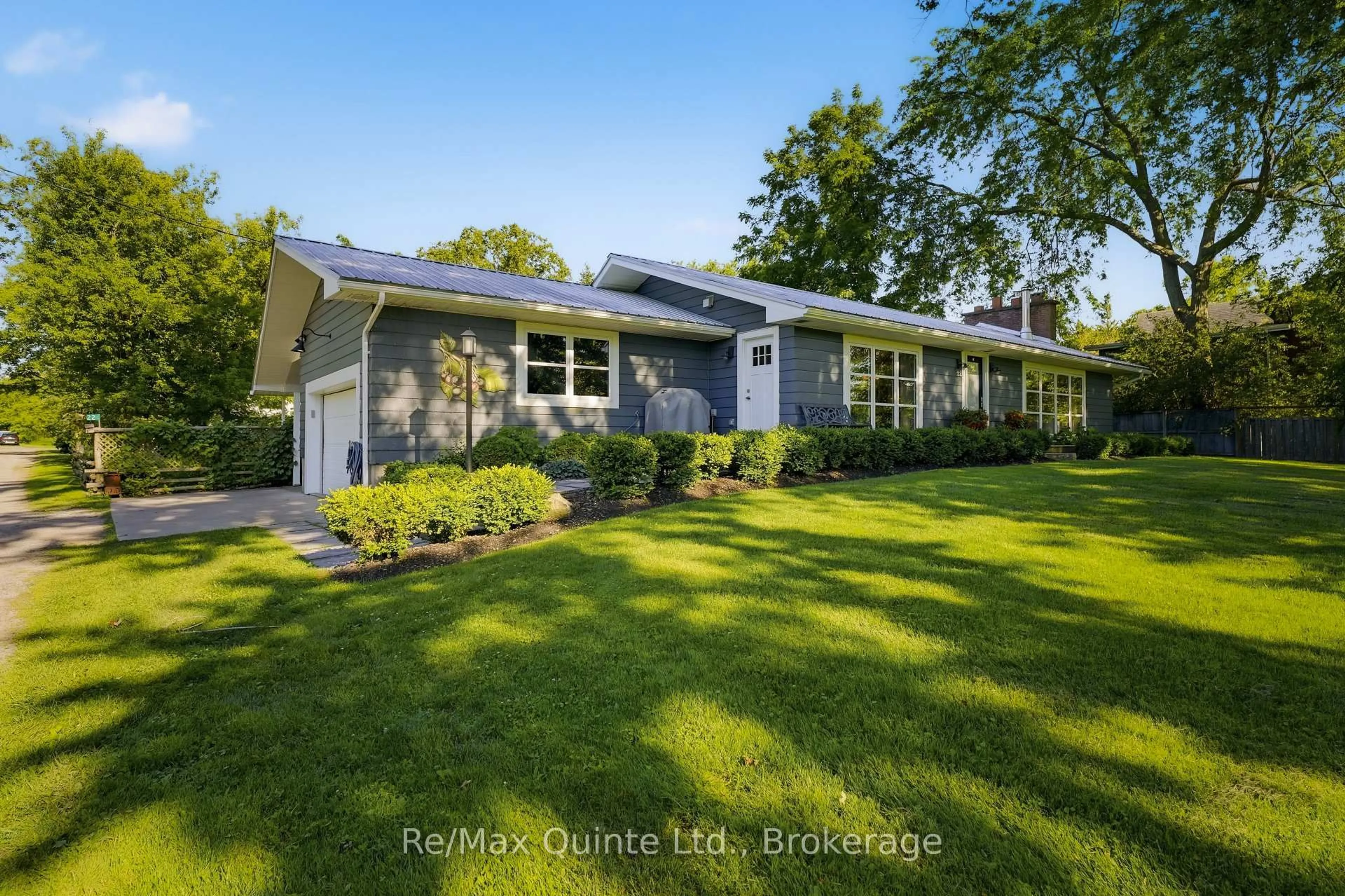 A pic from outside/outdoor area/front of a property/back of a property/a pic from drone, street for 22 Beckwith St, Prince Edward County Ontario K0K 1P0
