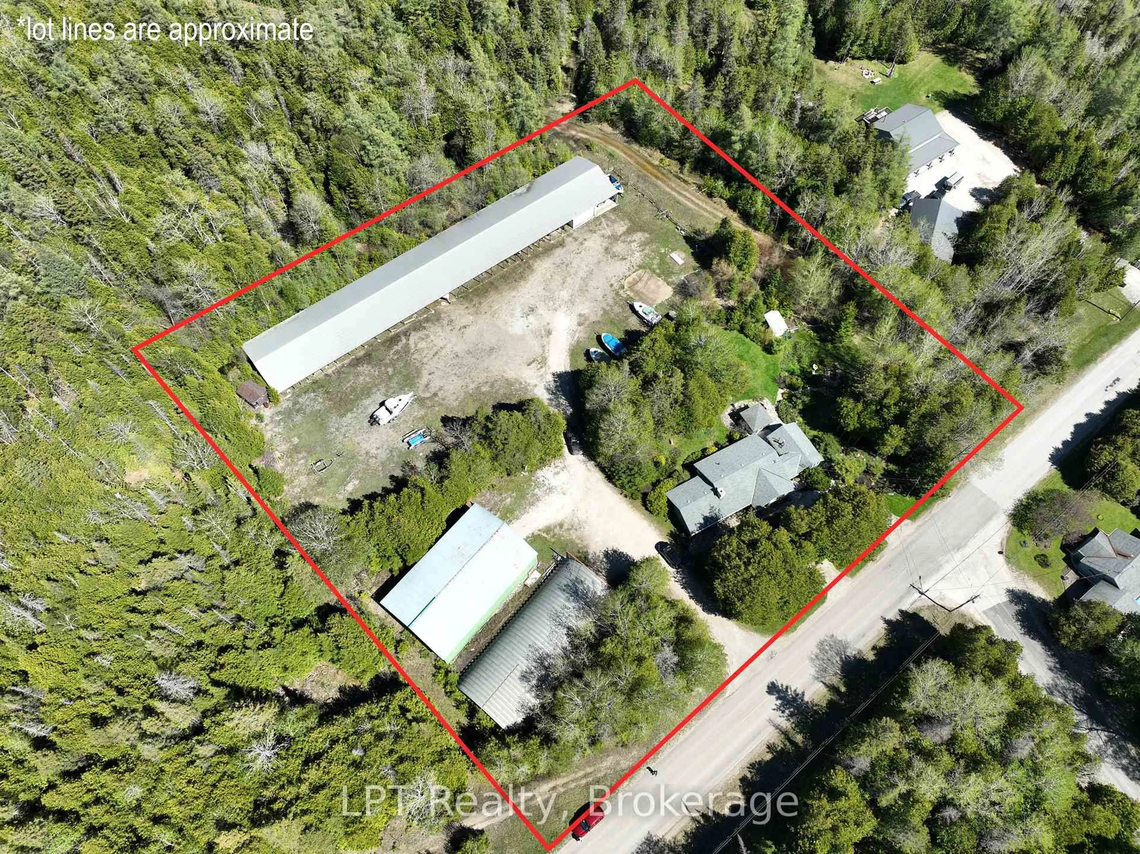 A pic from outside/outdoor area/front of a property/back of a property/a pic from drone, forest/trees view for 158 Stokes Bay Rd, Northern Bruce Peninsula Ontario N0H 1W0