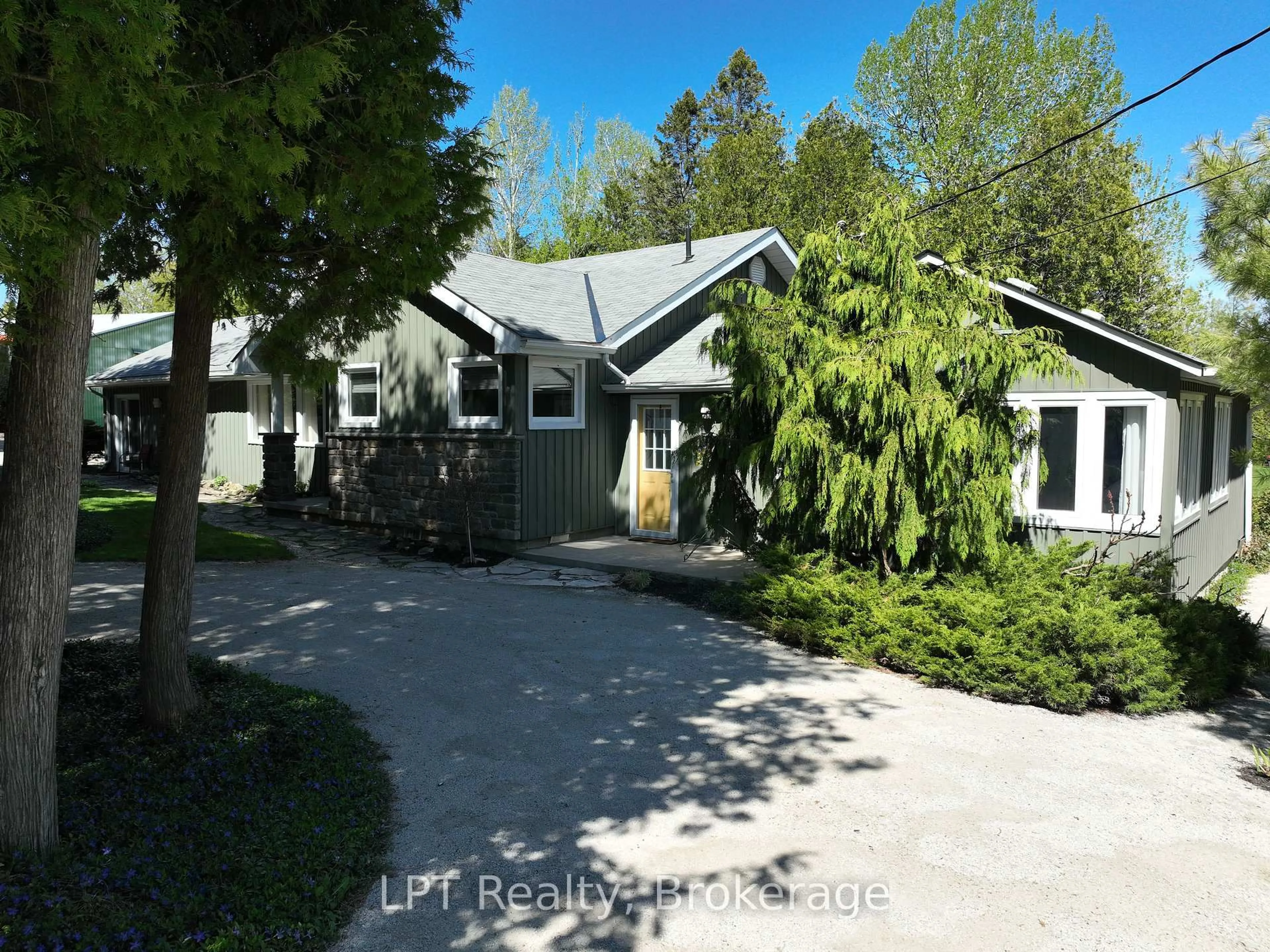 A pic from outside/outdoor area/front of a property/back of a property/a pic from drone, street for 158 Stokes Bay Rd, Northern Bruce Peninsula Ontario N0H 1W0