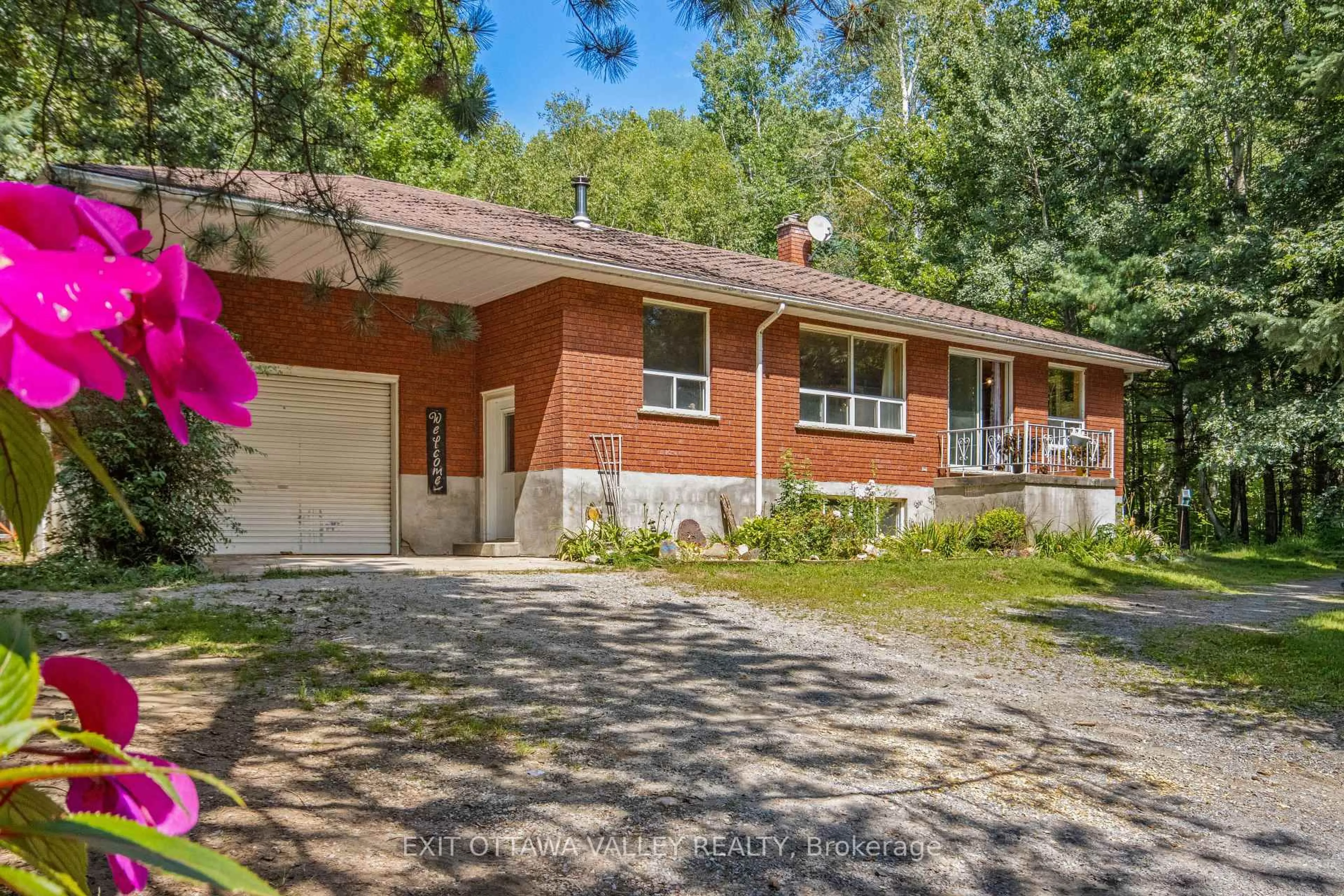 Home with brick exterior material, street for 561 Long Lake Rd, Barry's Bay Ontario K0J 1B0