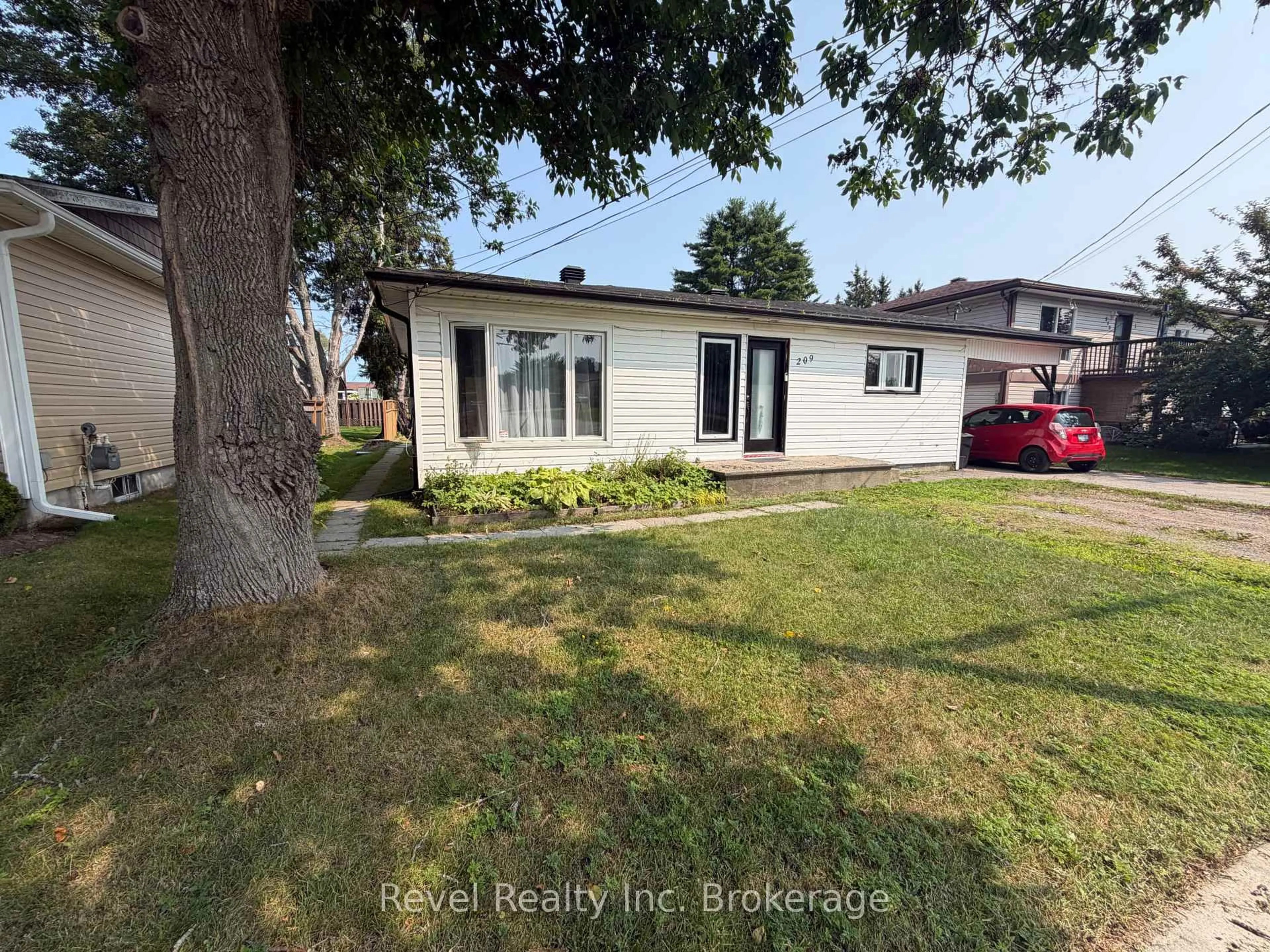A pic from outside/outdoor area/front of a property/back of a property/a pic from drone, street for 209 Salter St, West Nipissing Ontario P2B 3B5