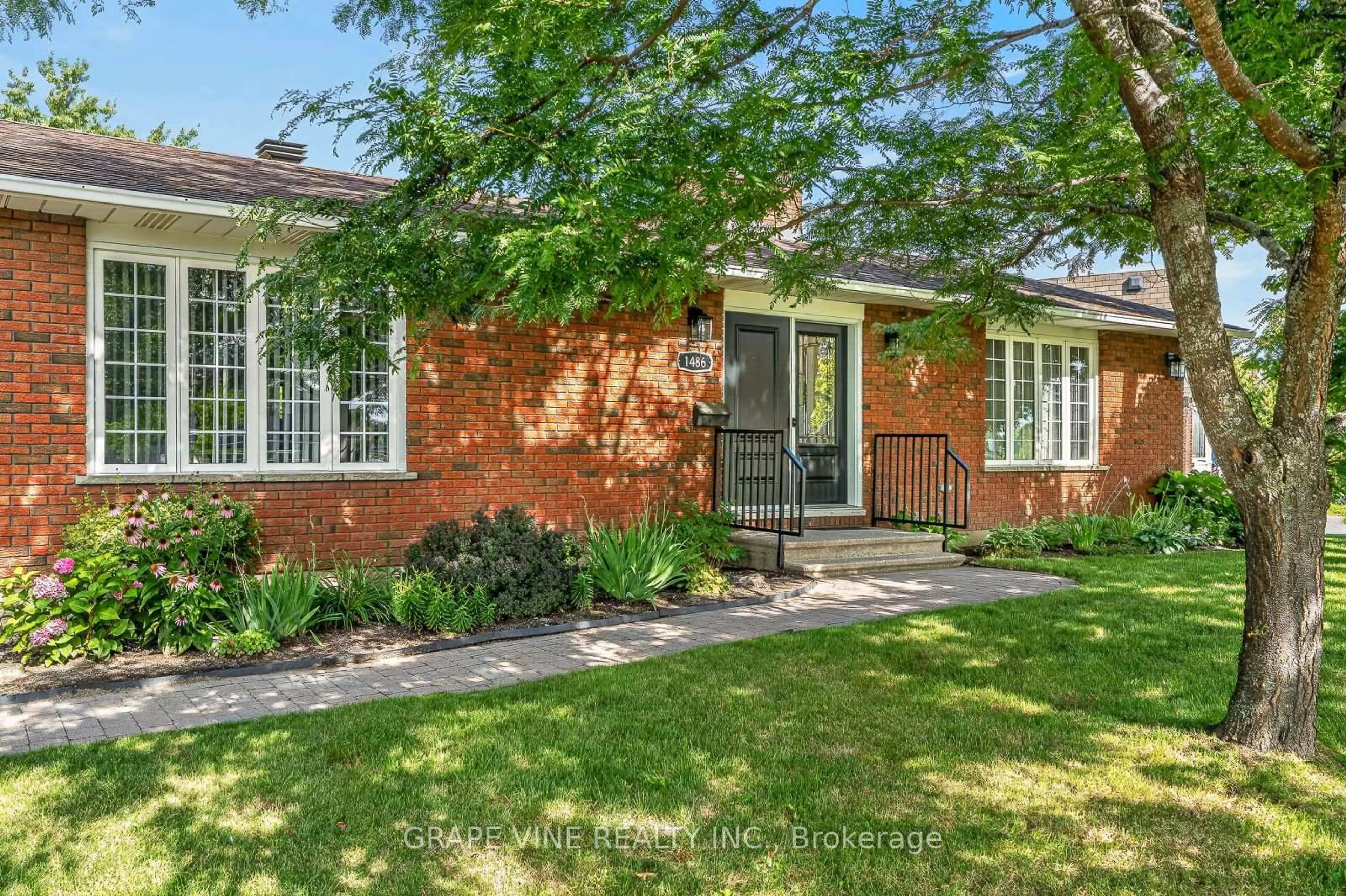 Home with brick exterior material, street for 1486 Ridgebrook Dr, Ottawa Ontario K1B 4H1