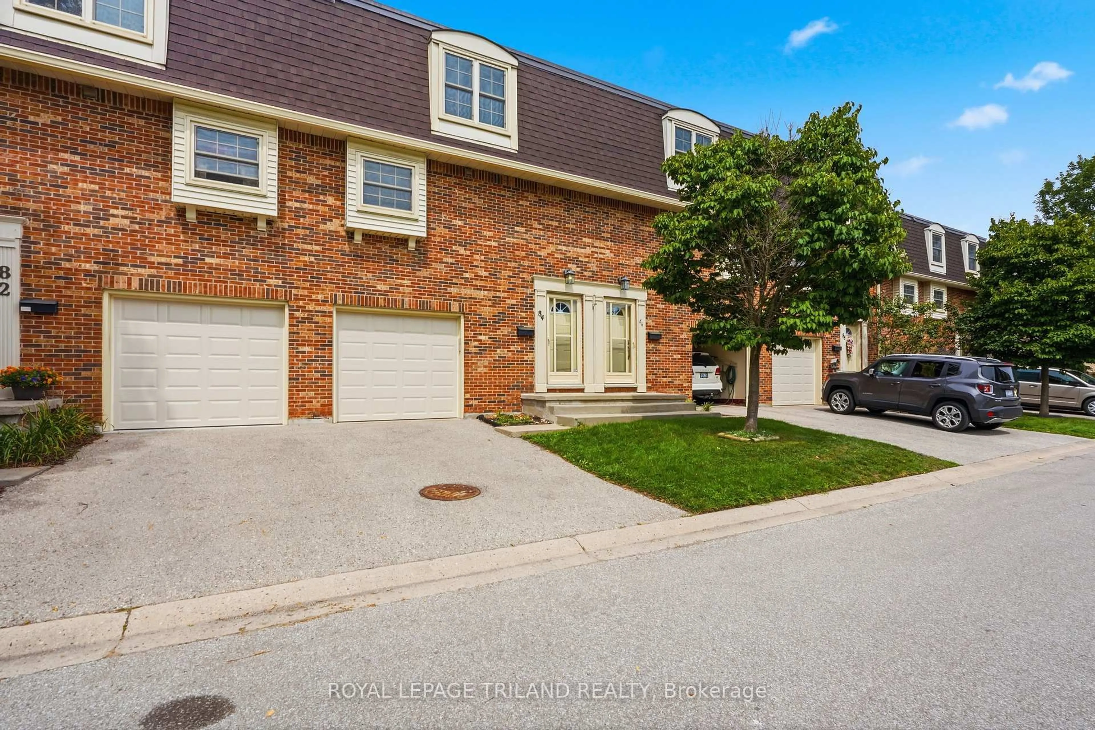 A pic from outside/outdoor area/front of a property/back of a property/a pic from drone, street for 900 Pond View Rd #84, London South Ontario N5Z 4L7