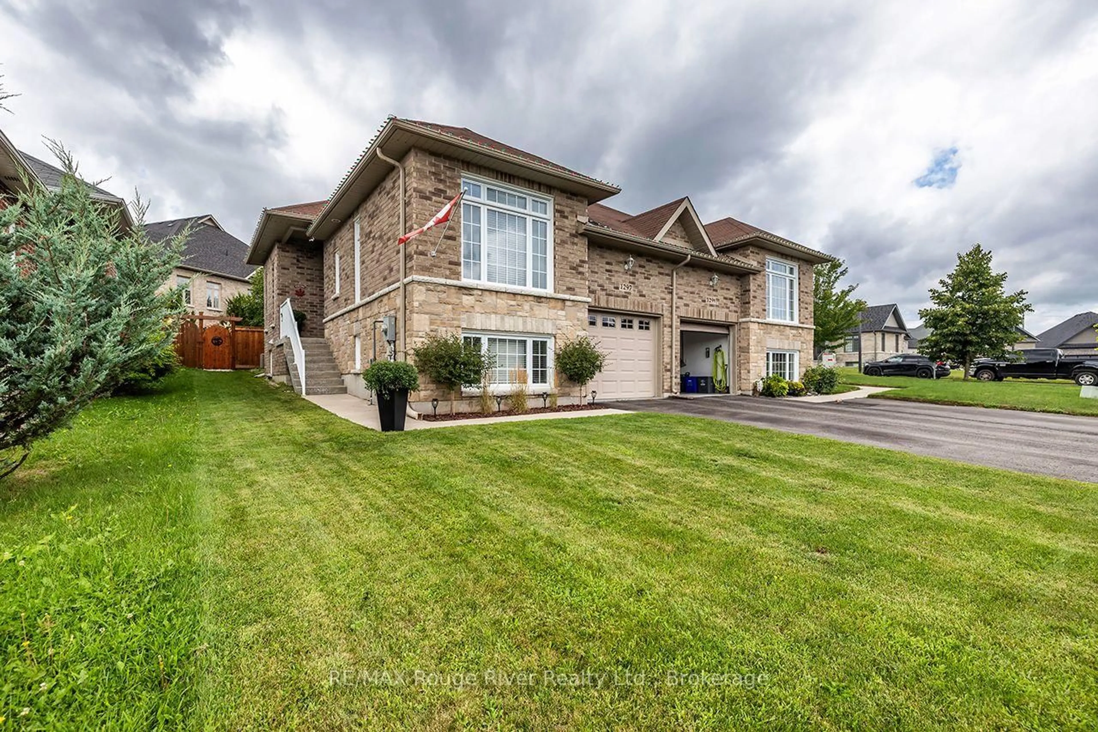 Home with brick exterior material, street for 1297 Alder Rd, Cobourg Ontario K9A 0J8