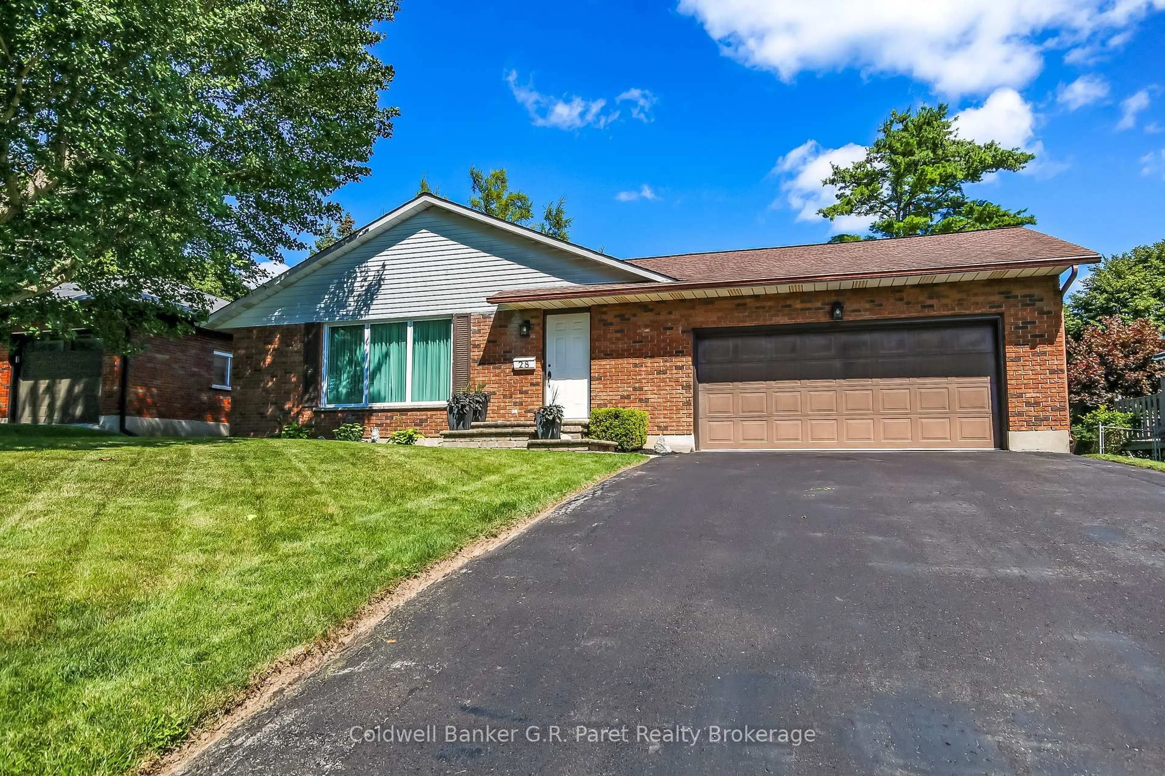 Home with brick exterior material, street for 28 Woodcock Dr, Tillsonburg Ontario N4G 4M2