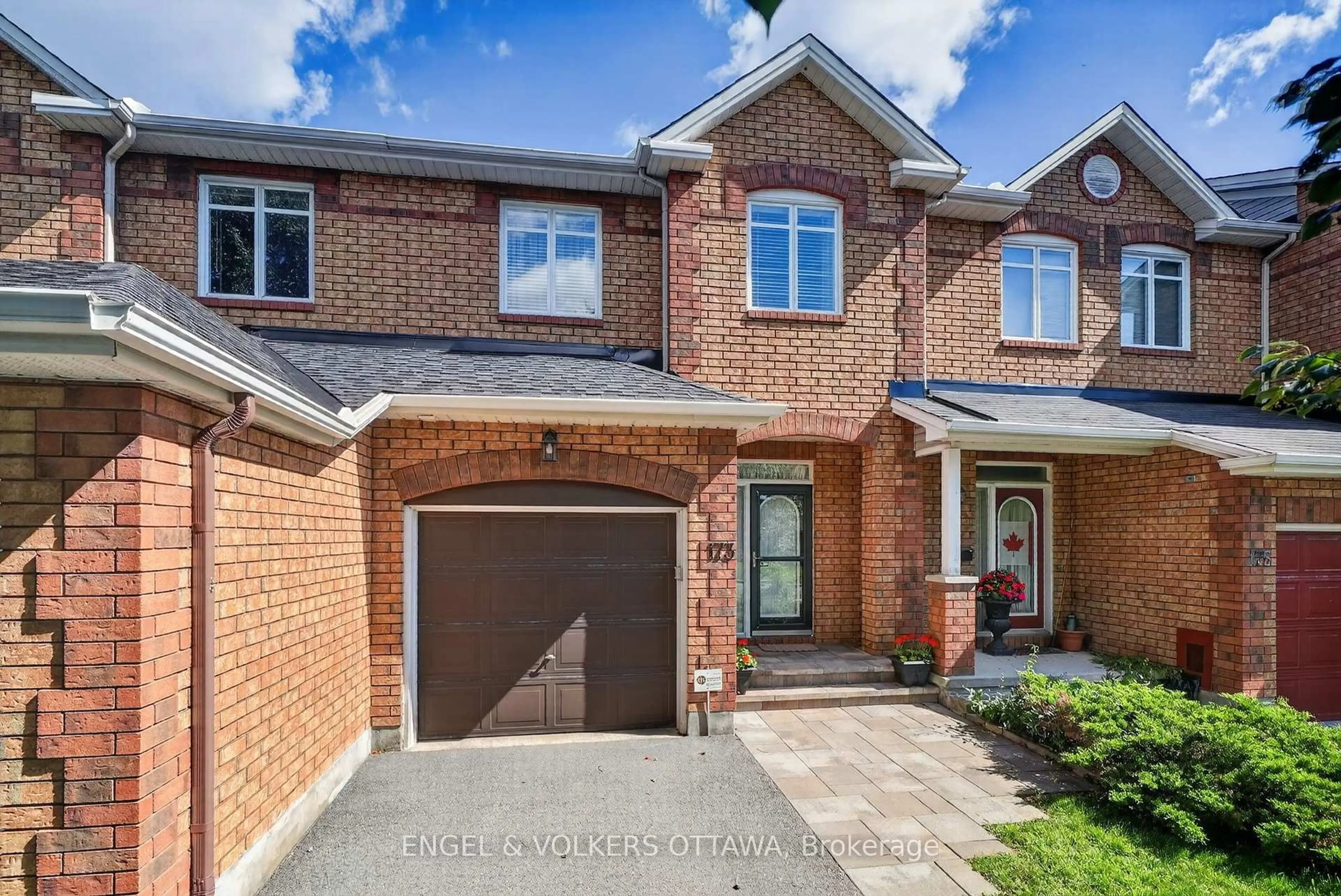 Home with brick exterior material, street for 173 Hearst Way, Kanata Ontario K2L 4G6