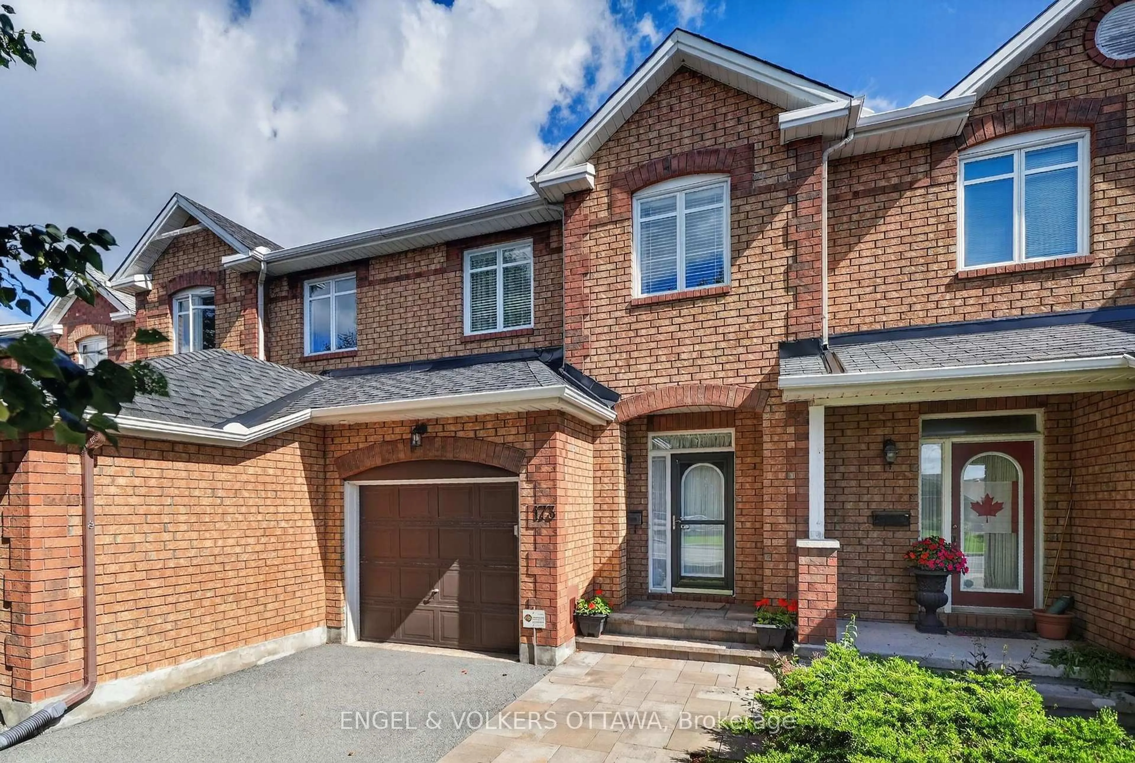 Home with brick exterior material, street for 173 Hearst Way, Kanata Ontario K2L 4G6