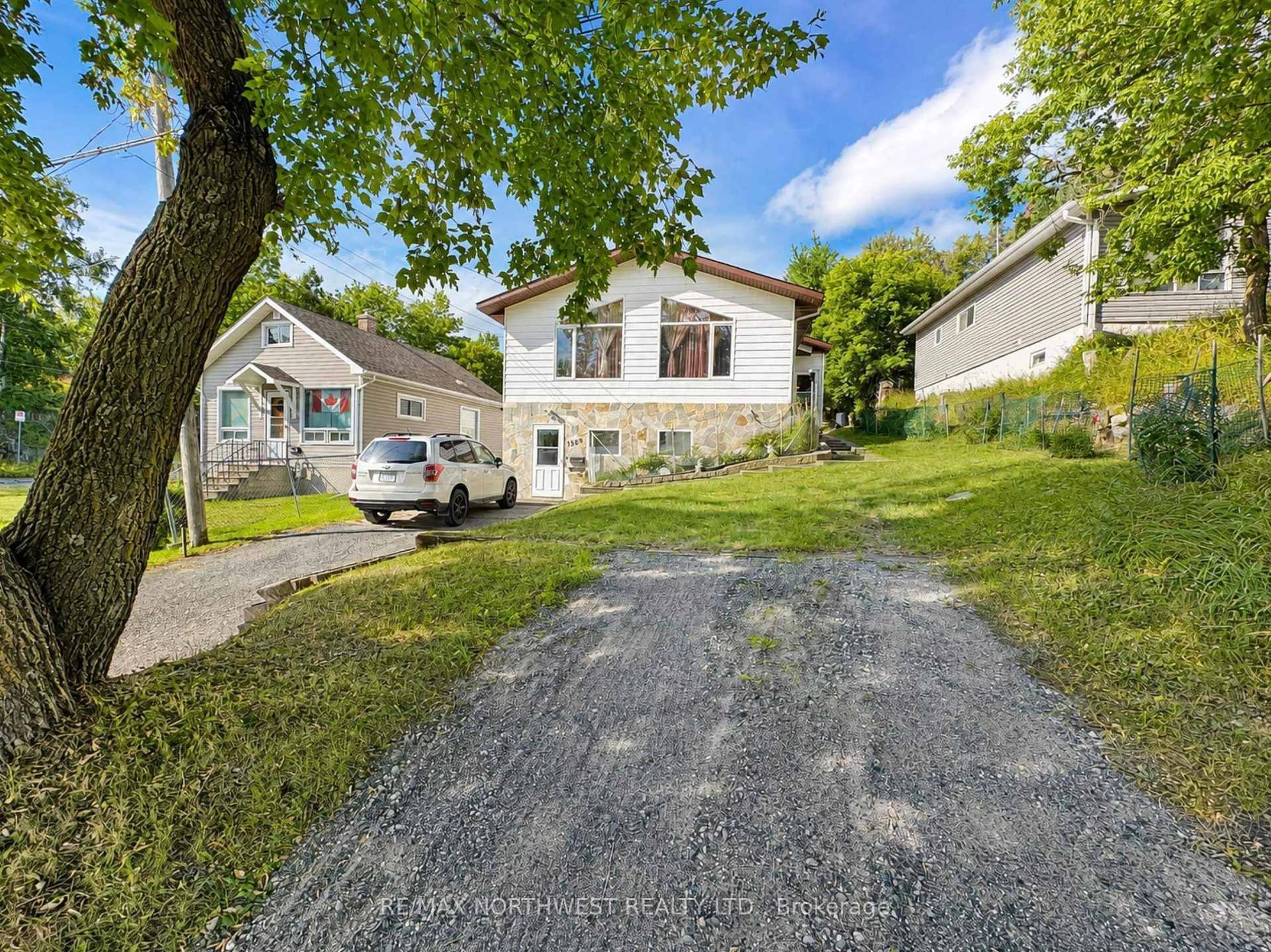 A pic from outside/outdoor area/front of a property/back of a property/a pic from drone, street for 1308 Eighth Street North, Kenora Ontario P9N 2S2