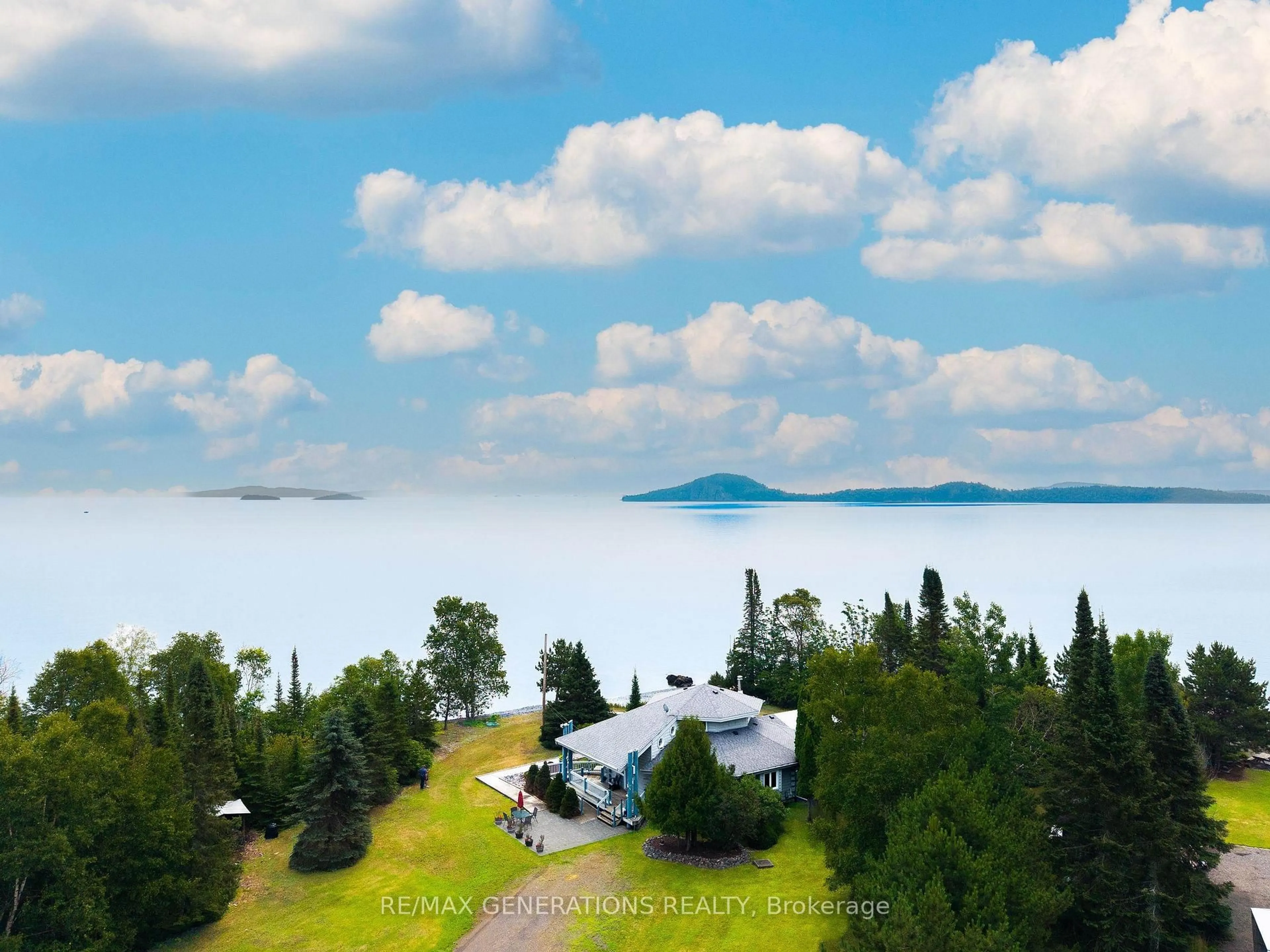 A pic from outside/outdoor area/front of a property/back of a property/a pic from drone, water/lake/river/ocean view for 106 Island Ave, Neebing Ontario P7L 0C1