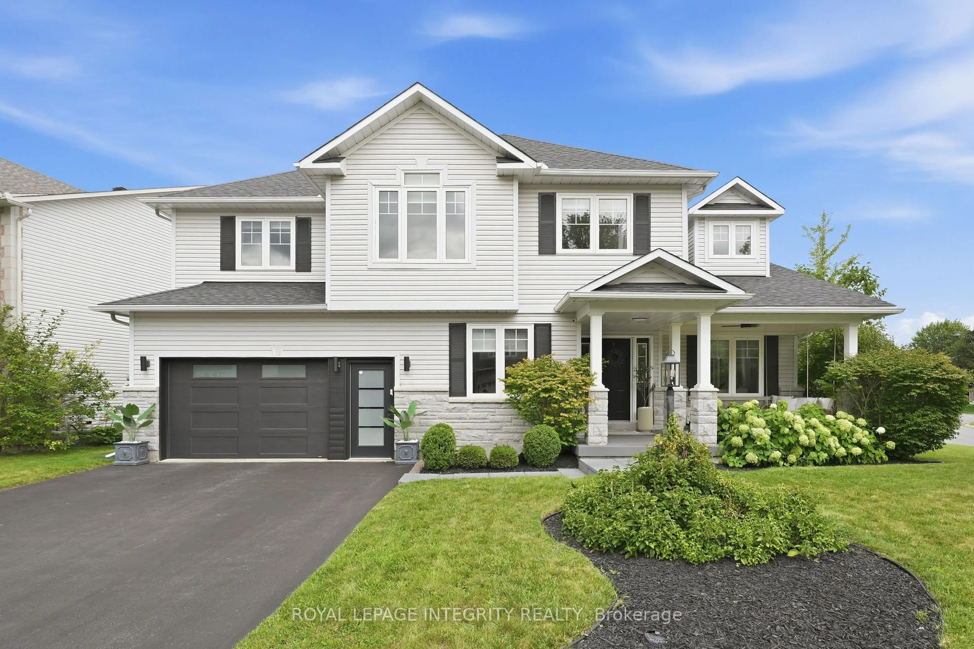Home with vinyl exterior material, street for 125 West Ridge Dr, Ottawa Ontario K2S 2H1