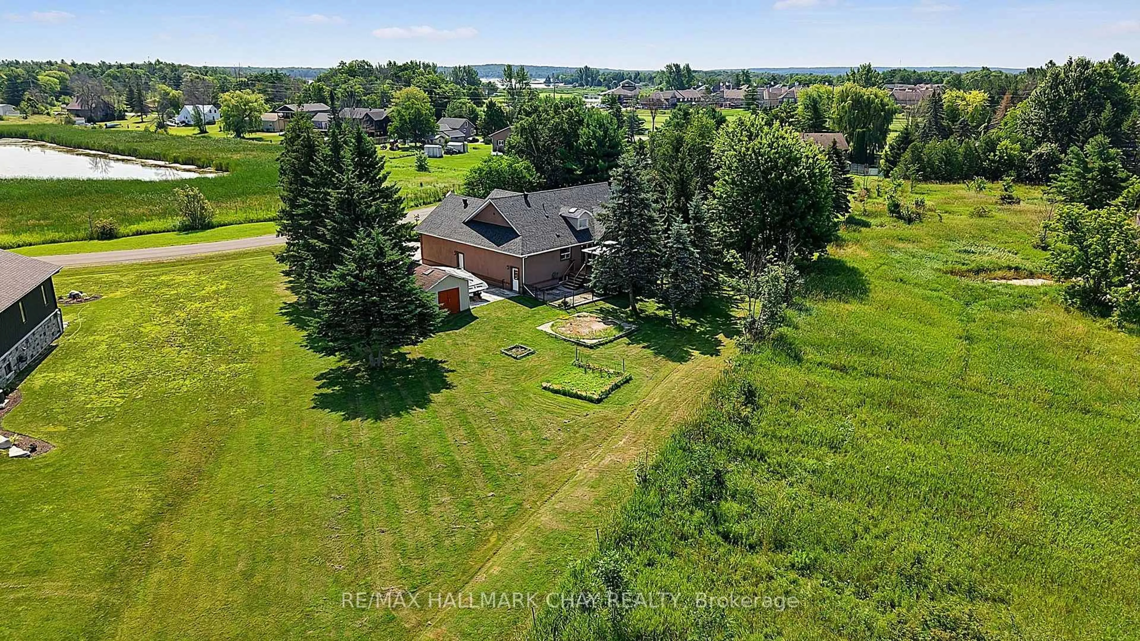 A pic from outside/outdoor area/front of a property/back of a property/a pic from drone, water/lake/river/ocean view for 31 Hillside Dr, Georgian Bay Ontario L0K 1S0