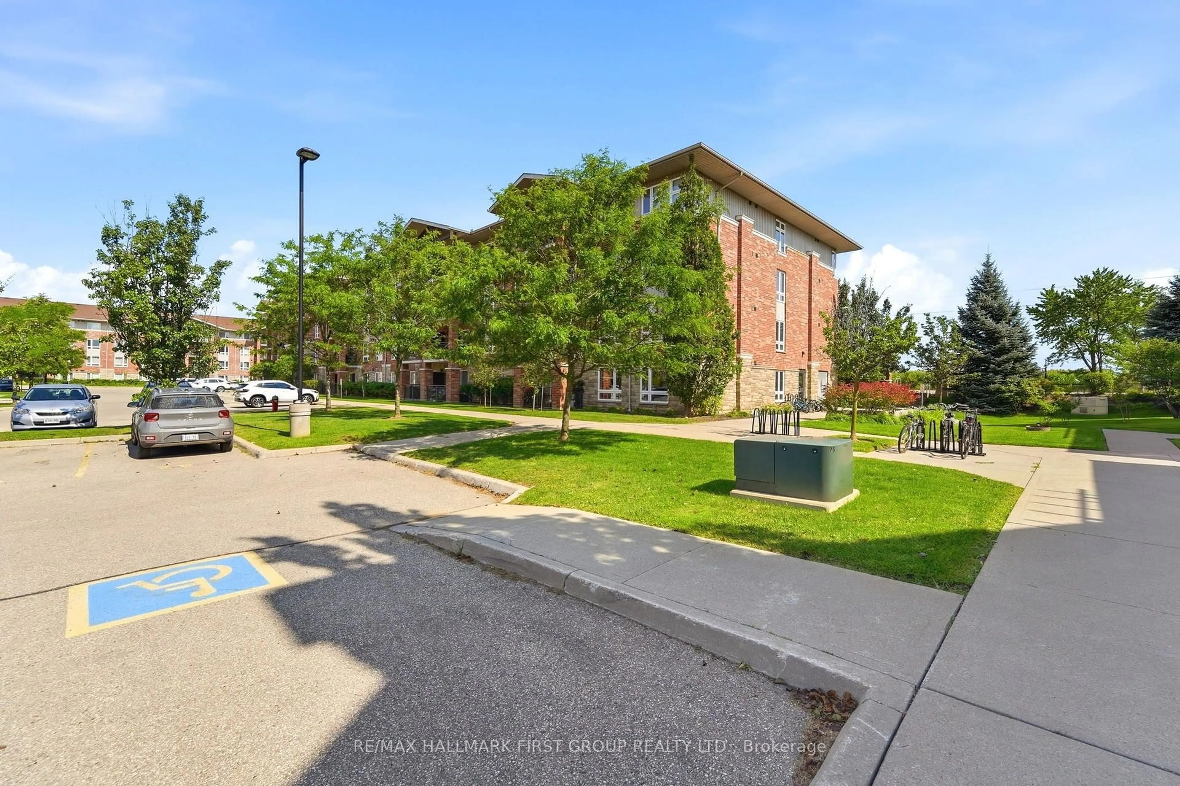 A pic from outside/outdoor area/front of a property/back of a property/a pic from drone, street for 19 Waterford Dr #403, Guelph Ontario N1L 0J1