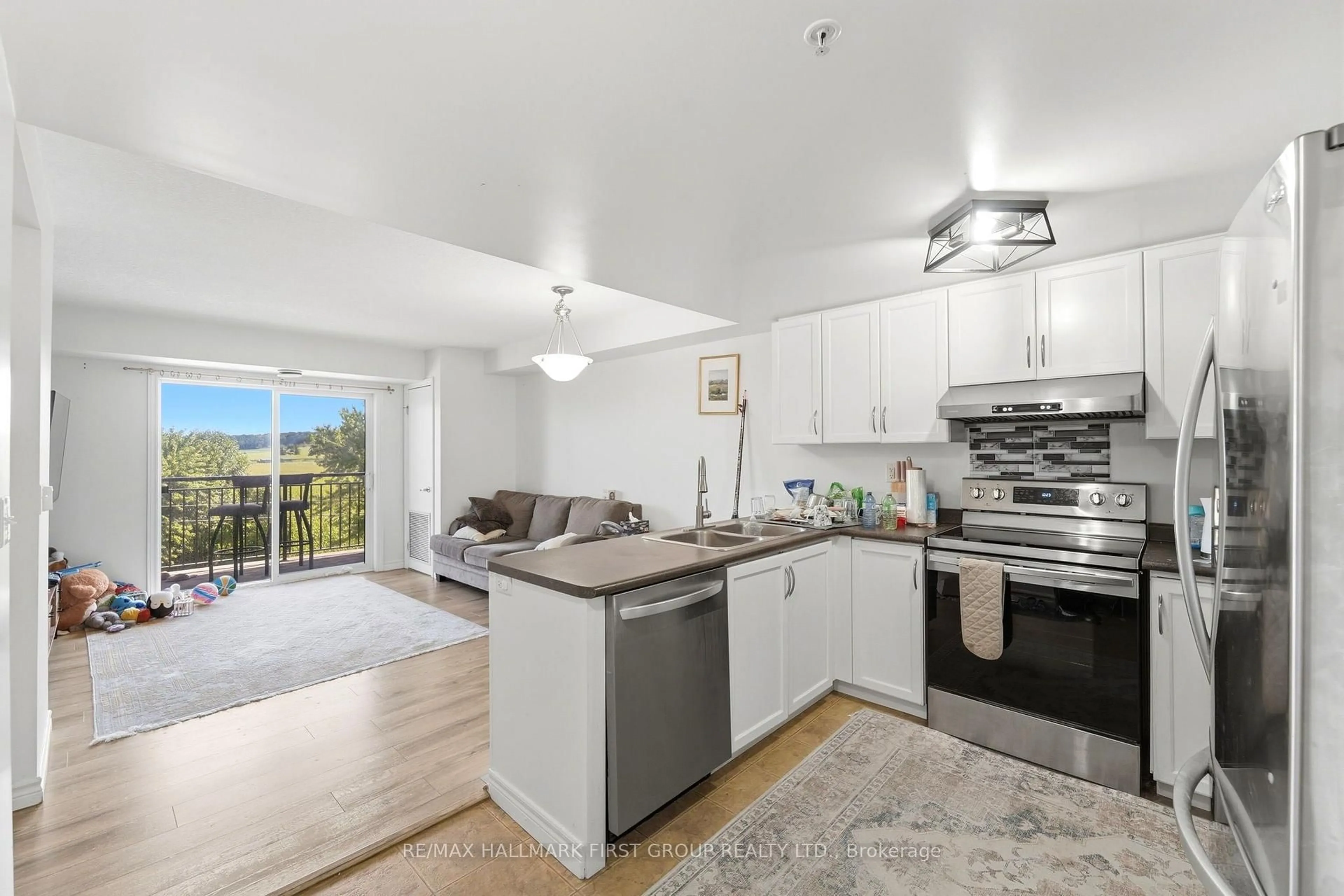 Open concept kitchen, unknown for 19 Waterford Dr #403, Guelph Ontario N1L 0J1