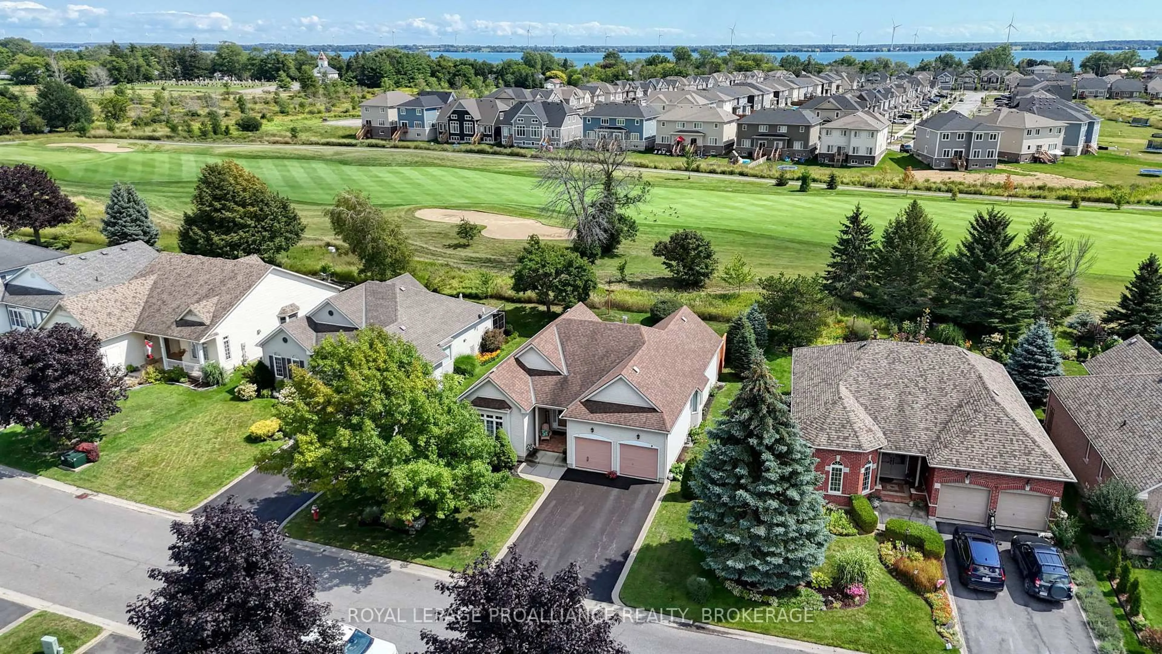 A pic from outside/outdoor area/front of a property/back of a property/a pic from drone, water/lake/river/ocean view for 86 Abbey Dawn Dr, Bath Ontario K0H 1G0