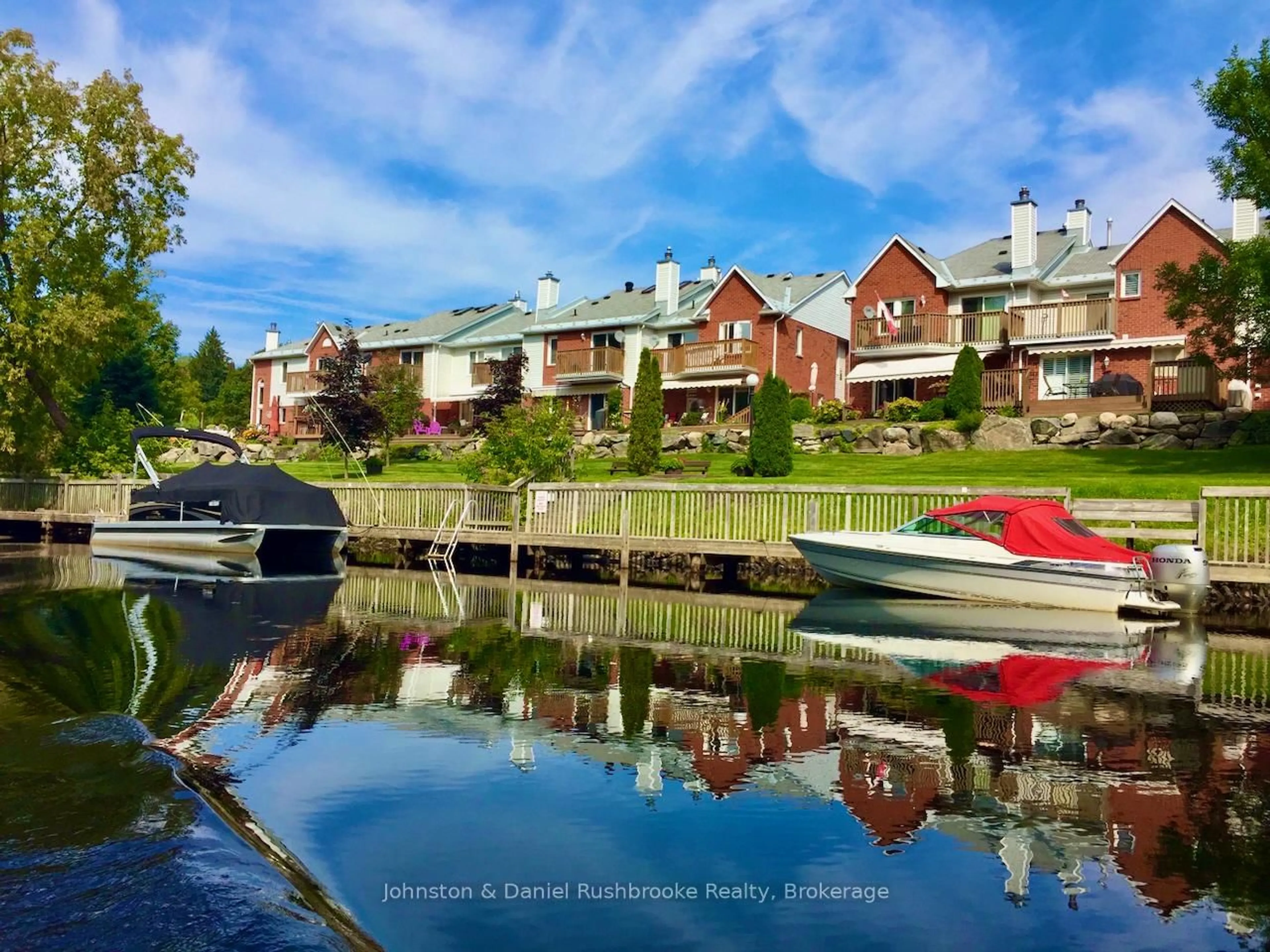 A pic from outside/outdoor area/front of a property/back of a property/a pic from drone, water/lake/river/ocean view for 39 Shoreline Dr, Bracebridge Ontario P1L 1Z3