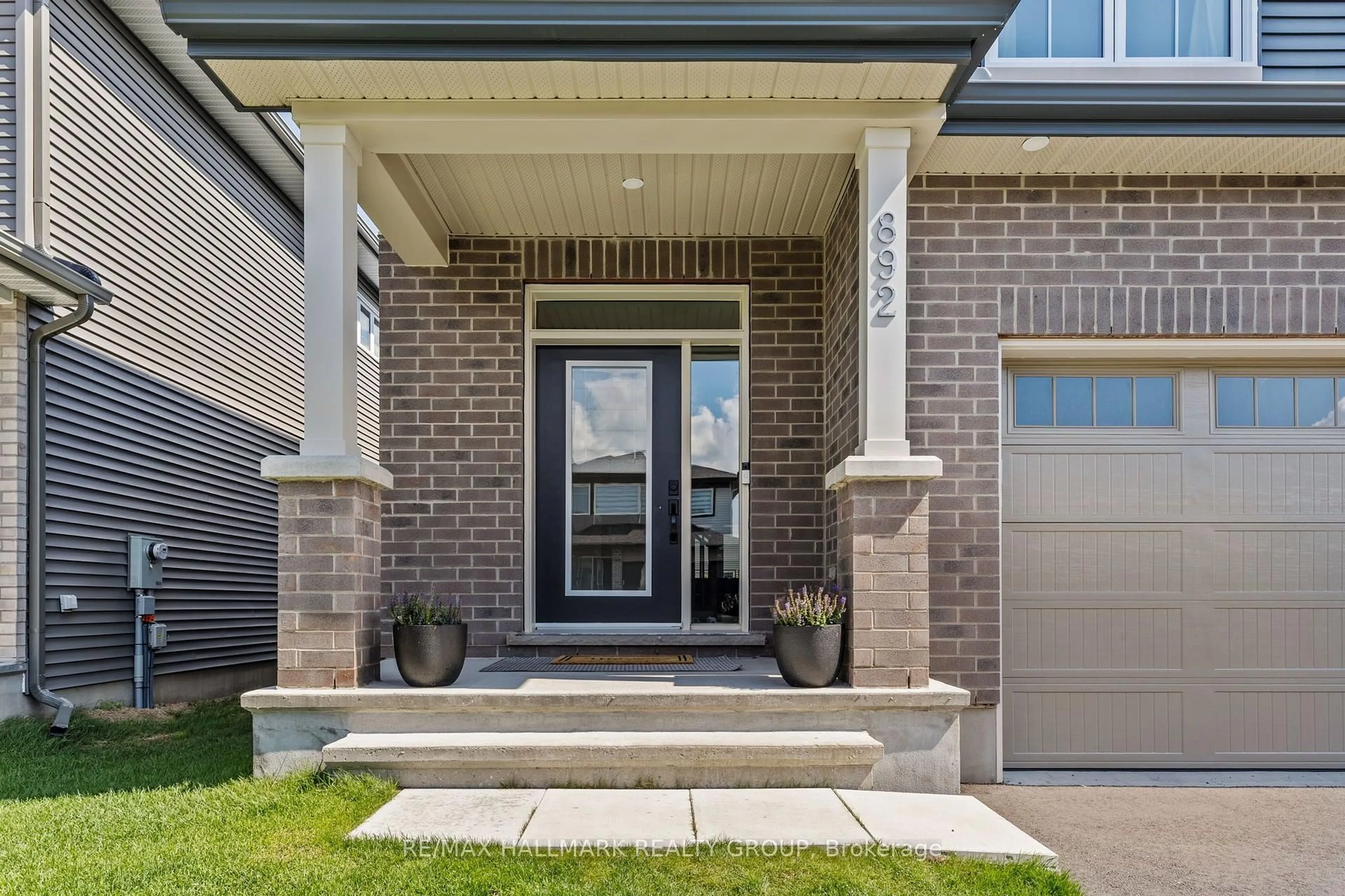 Home with brick exterior material, street for 892 Sendero Way, Stittsville Ontario K2S 2W8