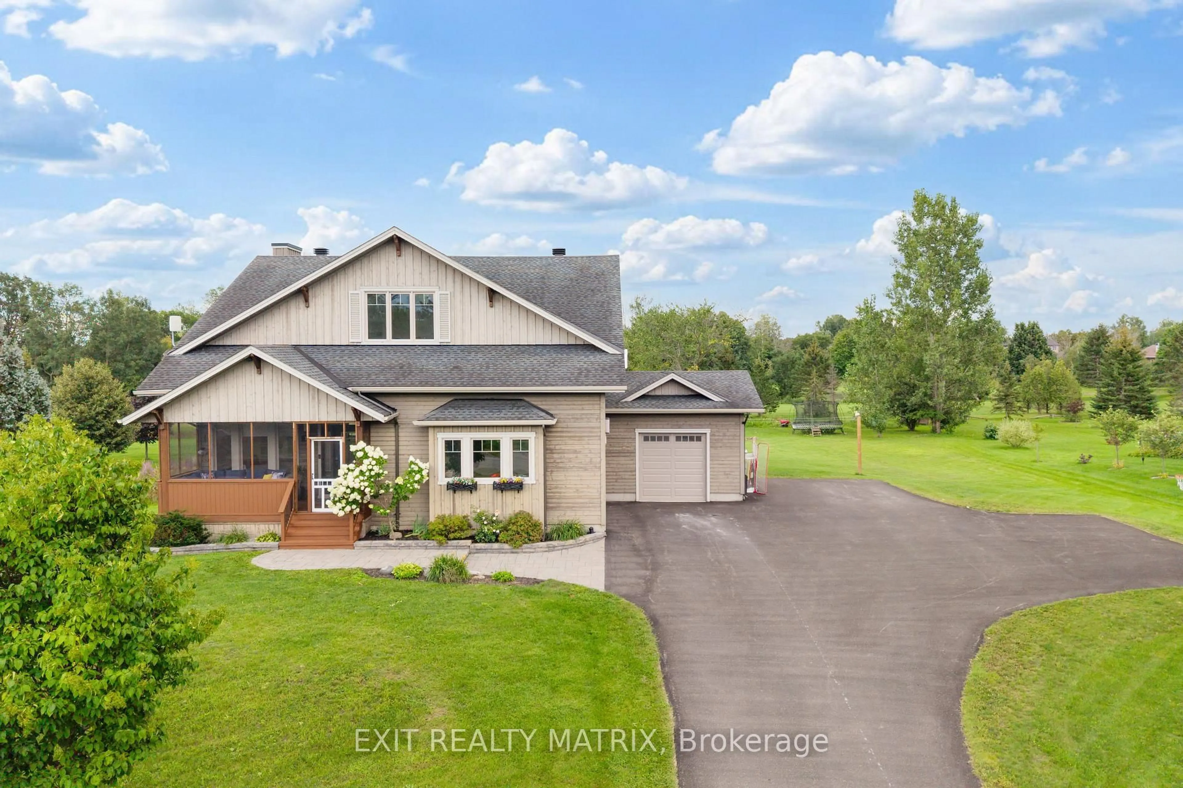 A pic from outside/outdoor area/front of a property/back of a property/a pic from drone, water/lake/river/ocean view for 123 Muirfield Crt, Pakenham Ontario K0A 2X0