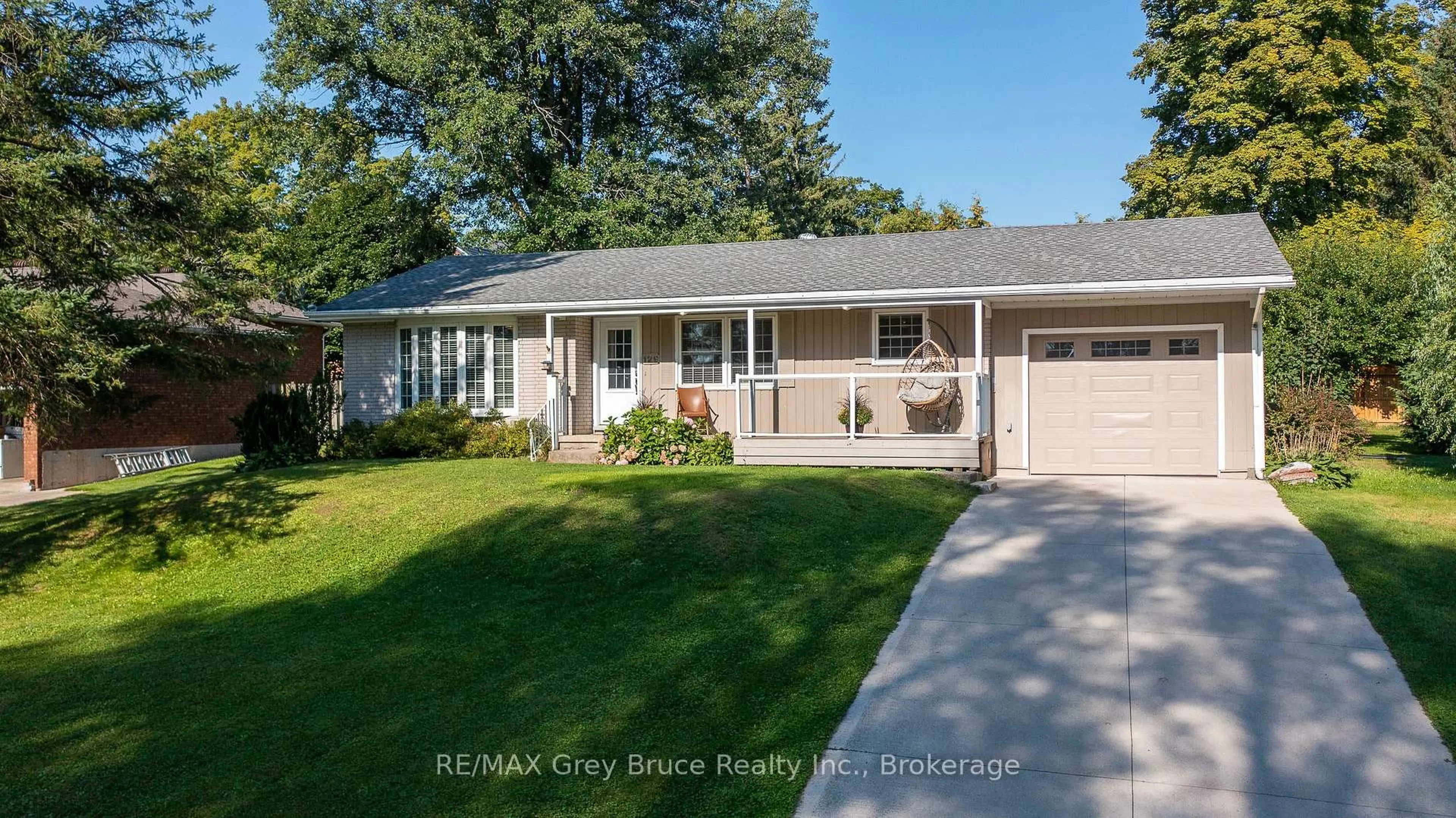 Home with vinyl exterior material, street for 129 River St, Arran-Elderslie Ontario N0H 2N0