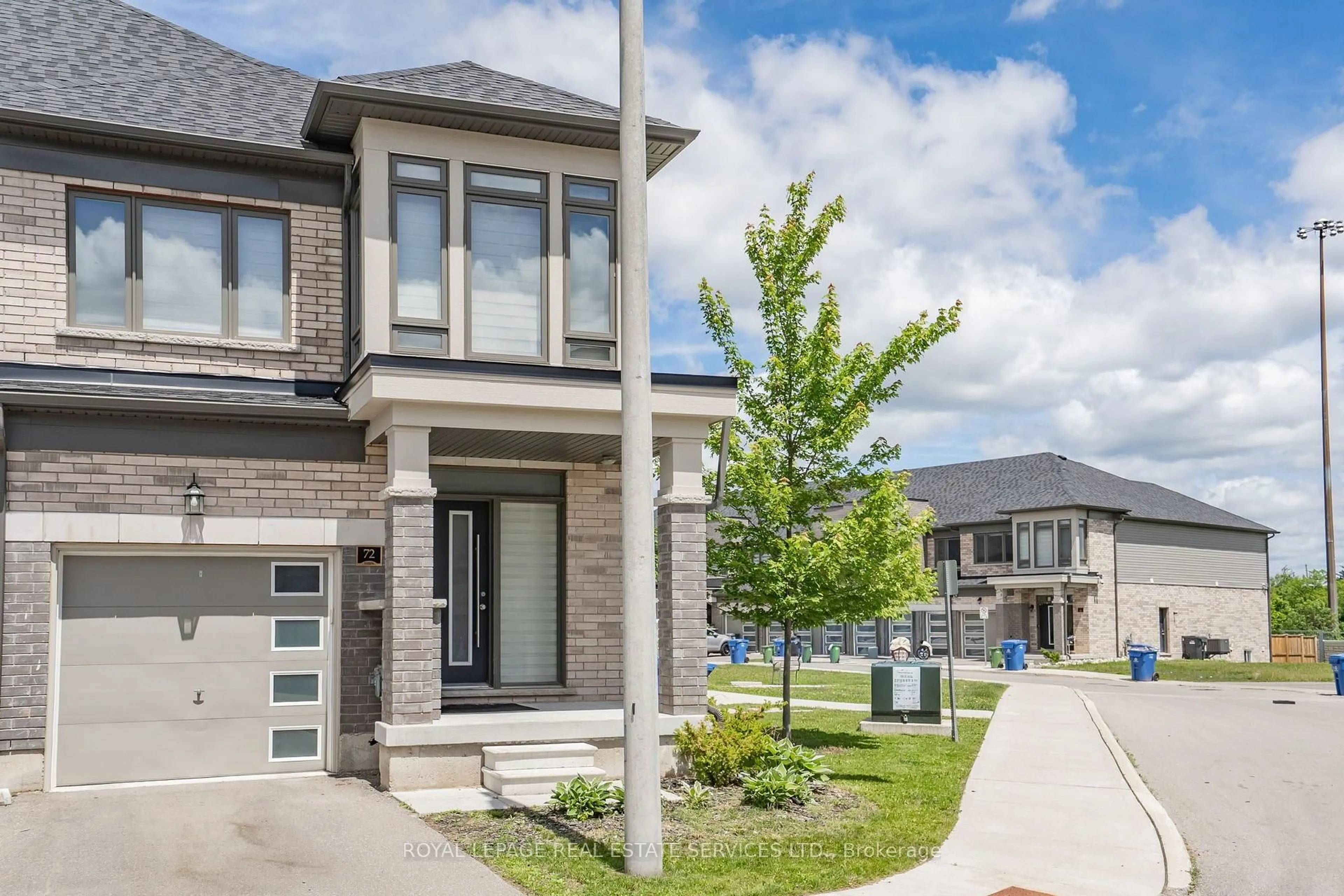 Home with brick exterior material, street for 166 Deerpath Dr #72, Guelph Ontario N1K 0E2