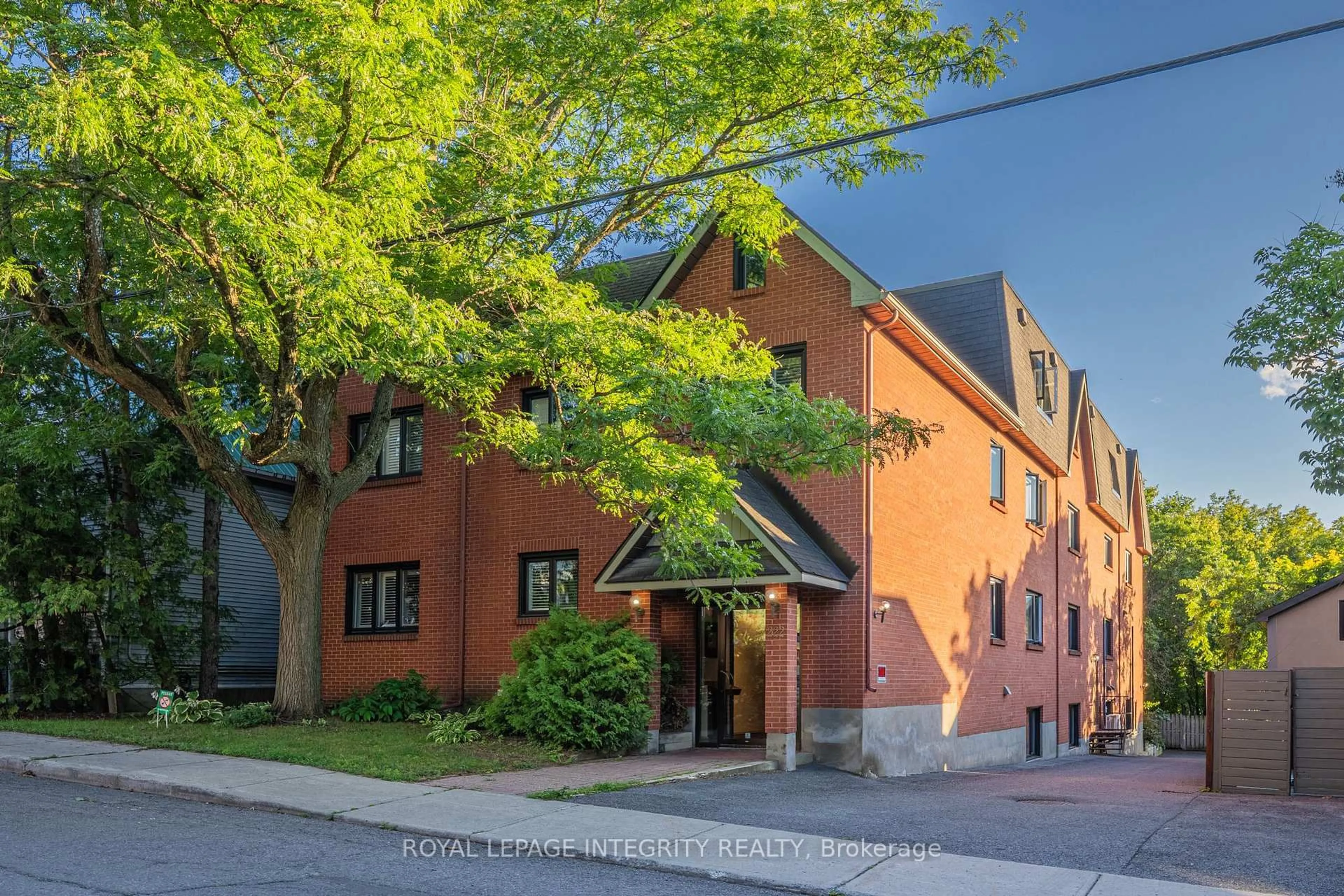 Home with brick exterior material, street for 222 Russell Ave #103, Ottawa Ontario K1N 7X5