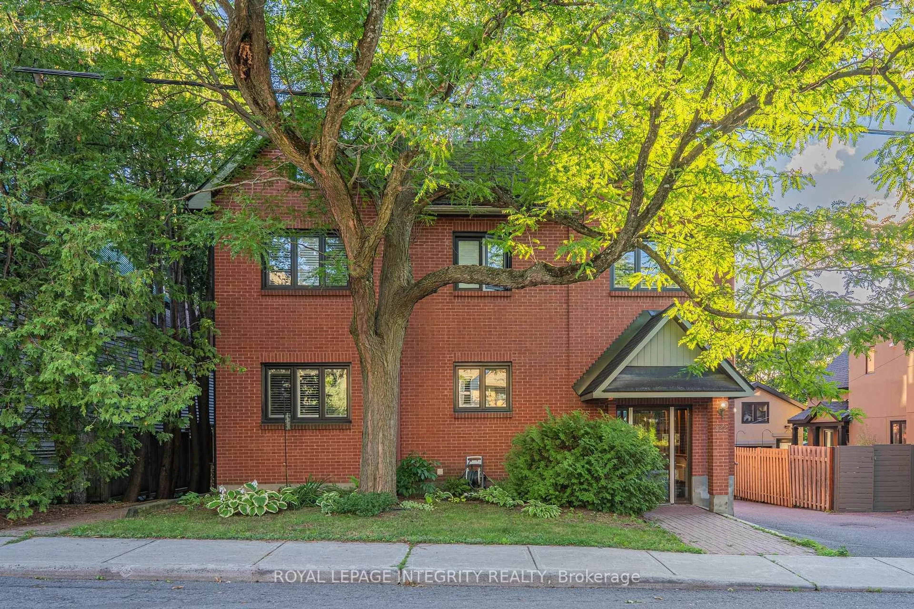 Home with brick exterior material, street for 222 Russell Ave #103, Ottawa Ontario K1N 7X5