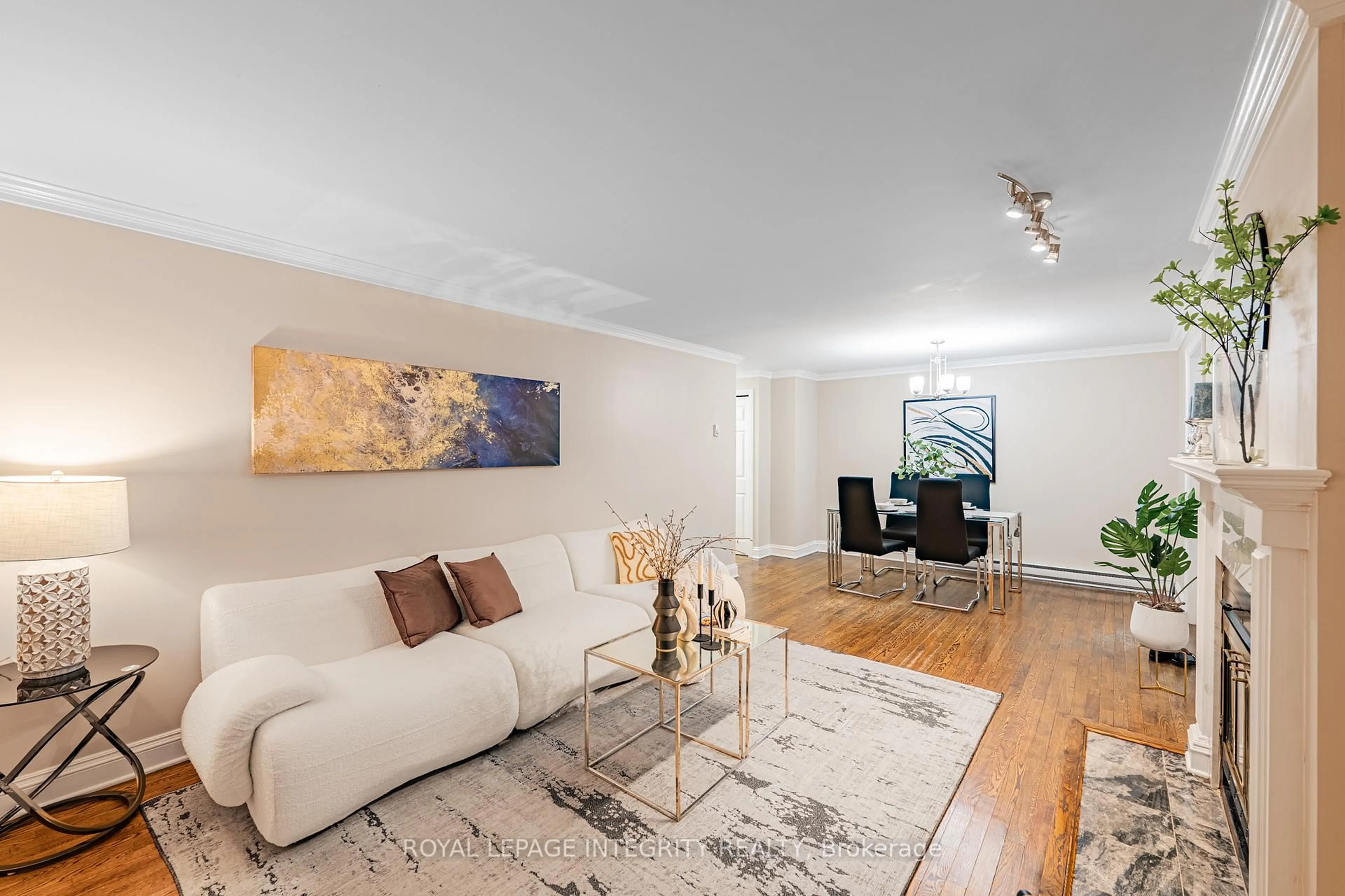 Living room with furniture, wood/laminate floor for 222 Russell Ave #103, Ottawa Ontario K1N 7X5
