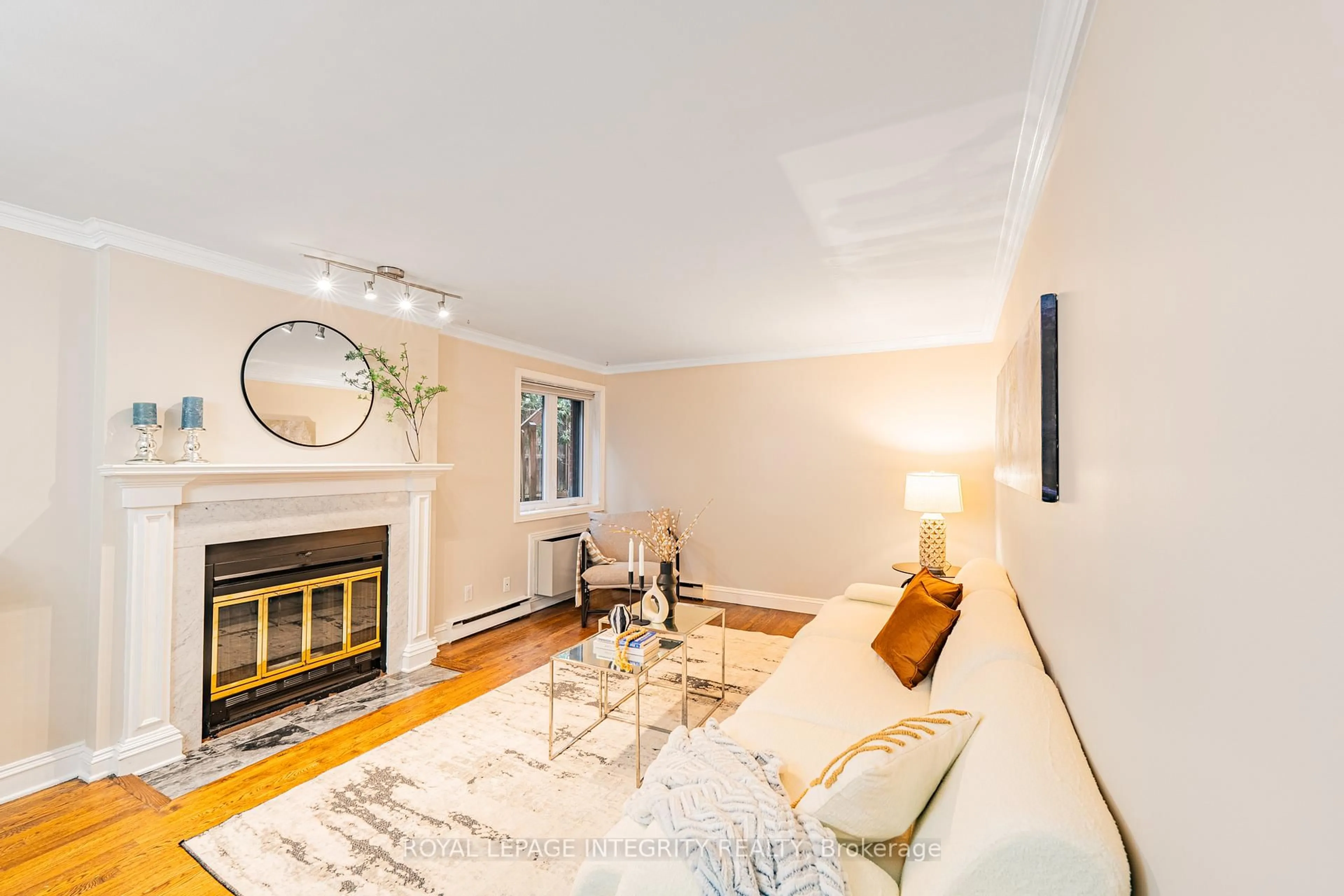 Living room with furniture, wood/laminate floor for 222 Russell Ave #103, Ottawa Ontario K1N 7X5