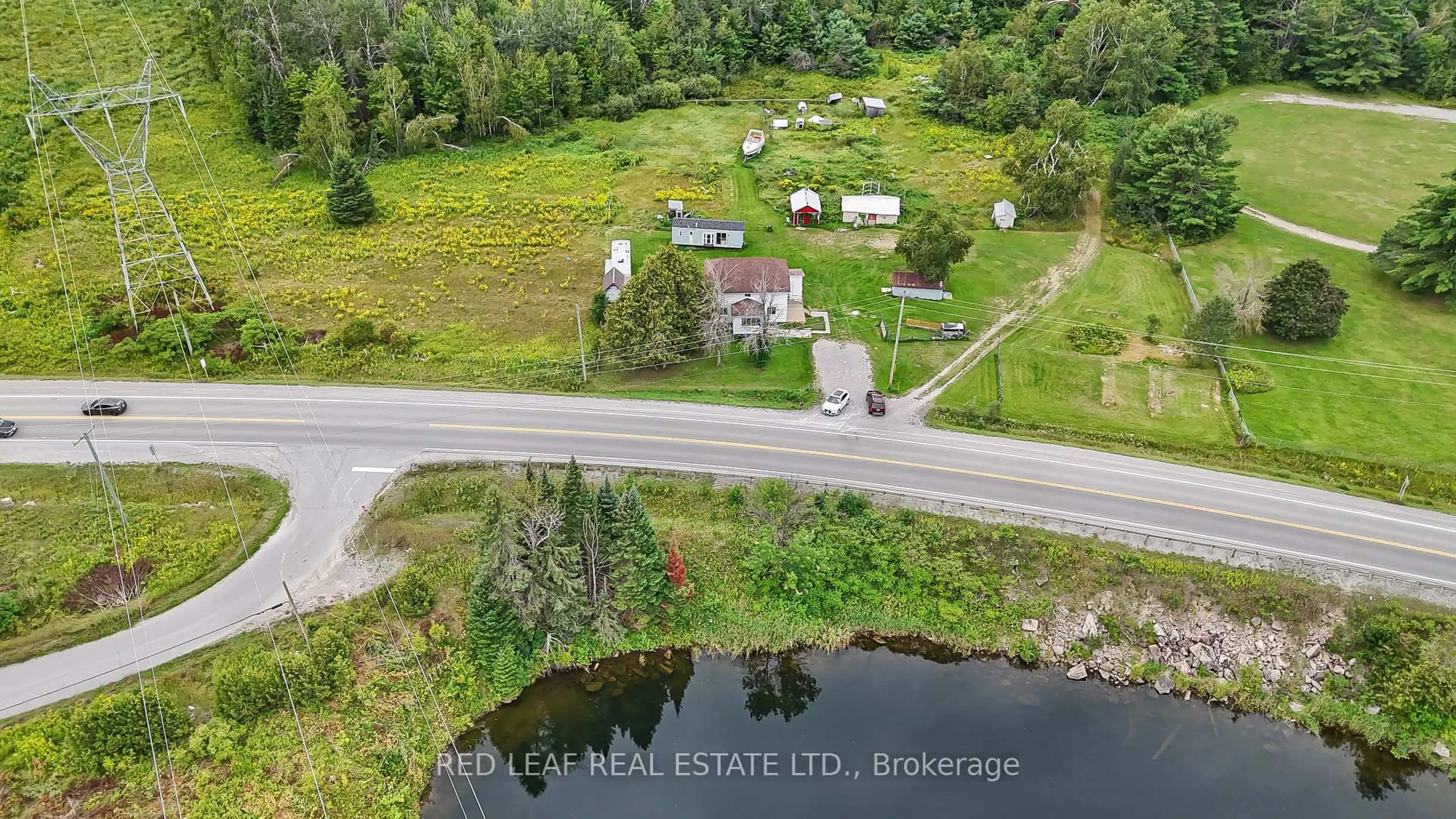 A pic from outside/outdoor area/front of a property/back of a property/a pic from drone, water/lake/river/ocean view for 7657 Hwy 35, Kawartha Lakes Ontario K0M 0B3