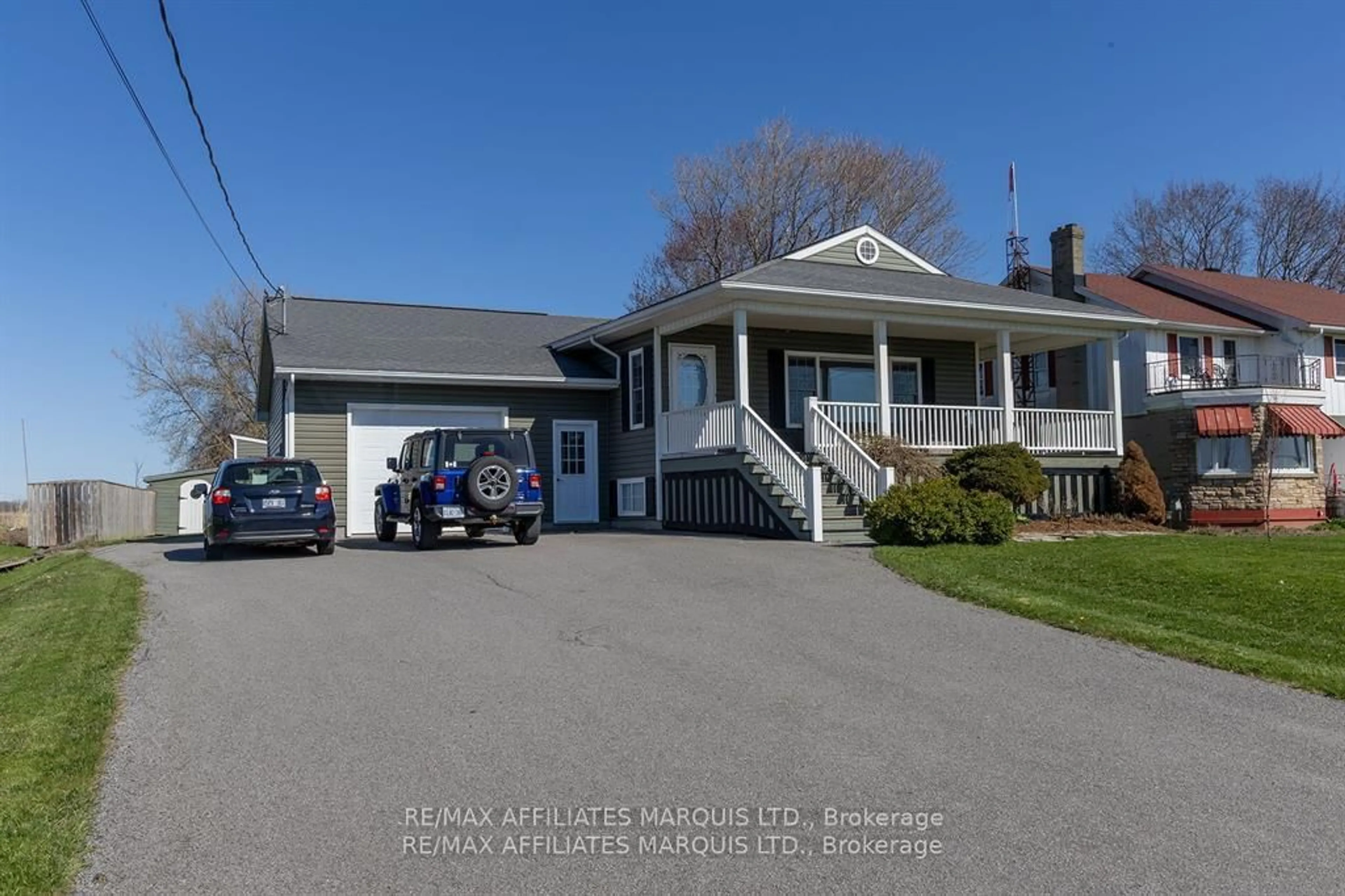 Home with vinyl exterior material, street for 11851 Lakeshore Dr, South Dundas Ontario K0C 1X0