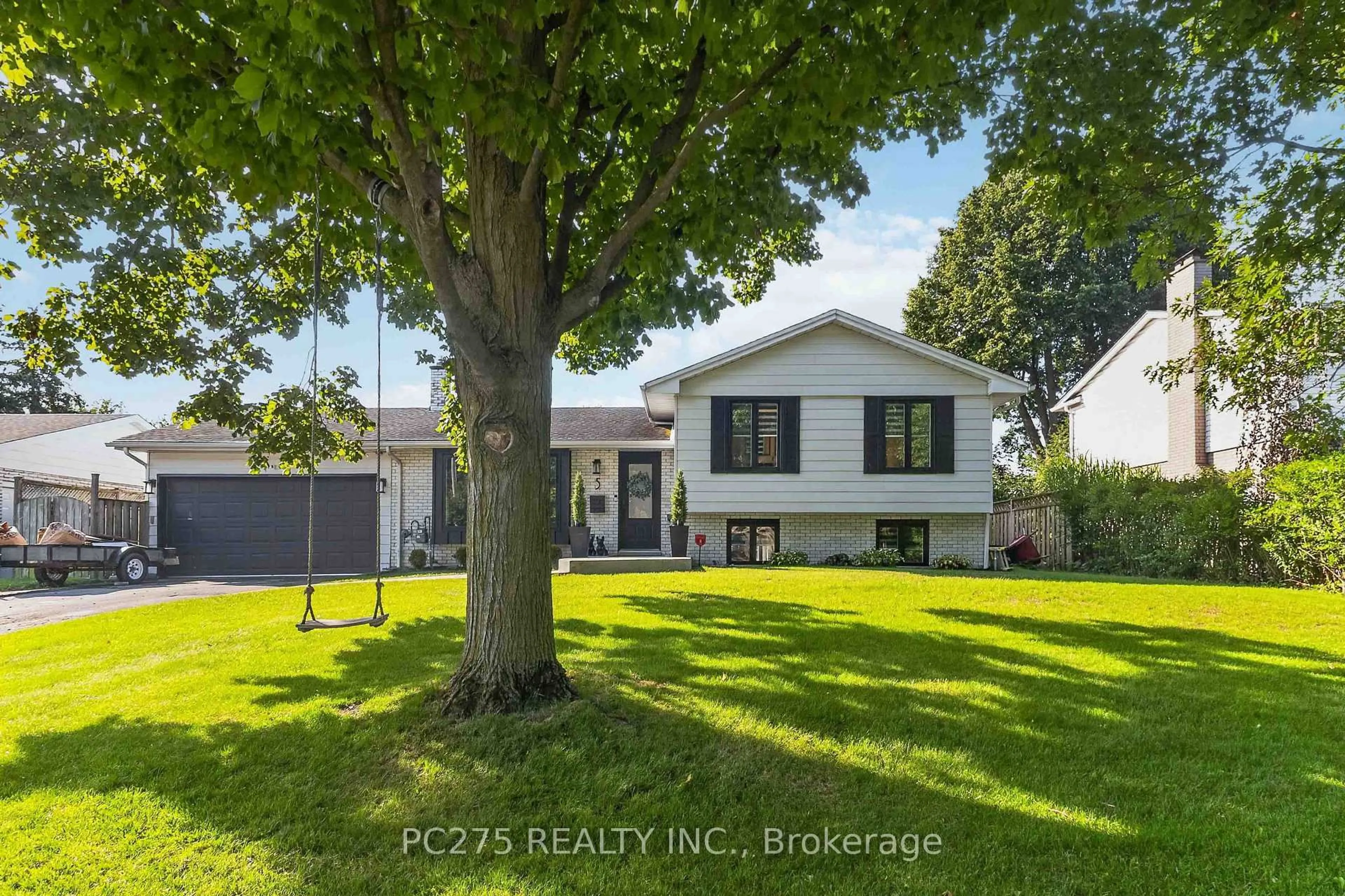 A pic from outside/outdoor area/front of a property/back of a property/a pic from drone, street for 5 Field Rd, London South Ontario N6P 1C4
