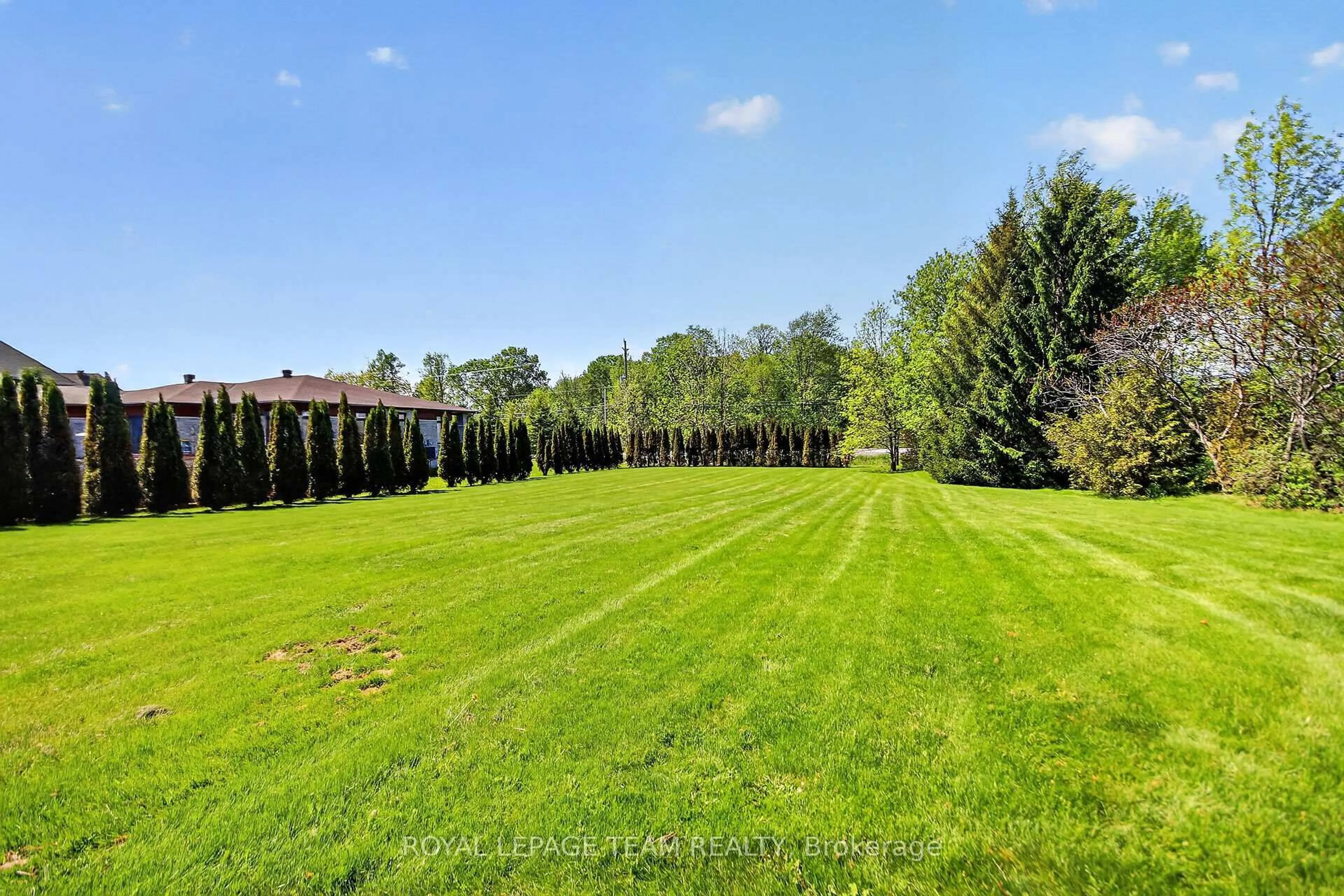 A pic from outside/outdoor area/front of a property/back of a property/a pic from drone, forest/trees view for 5472 Wicklow Dr, Ottawa Ontario K4M 1C4