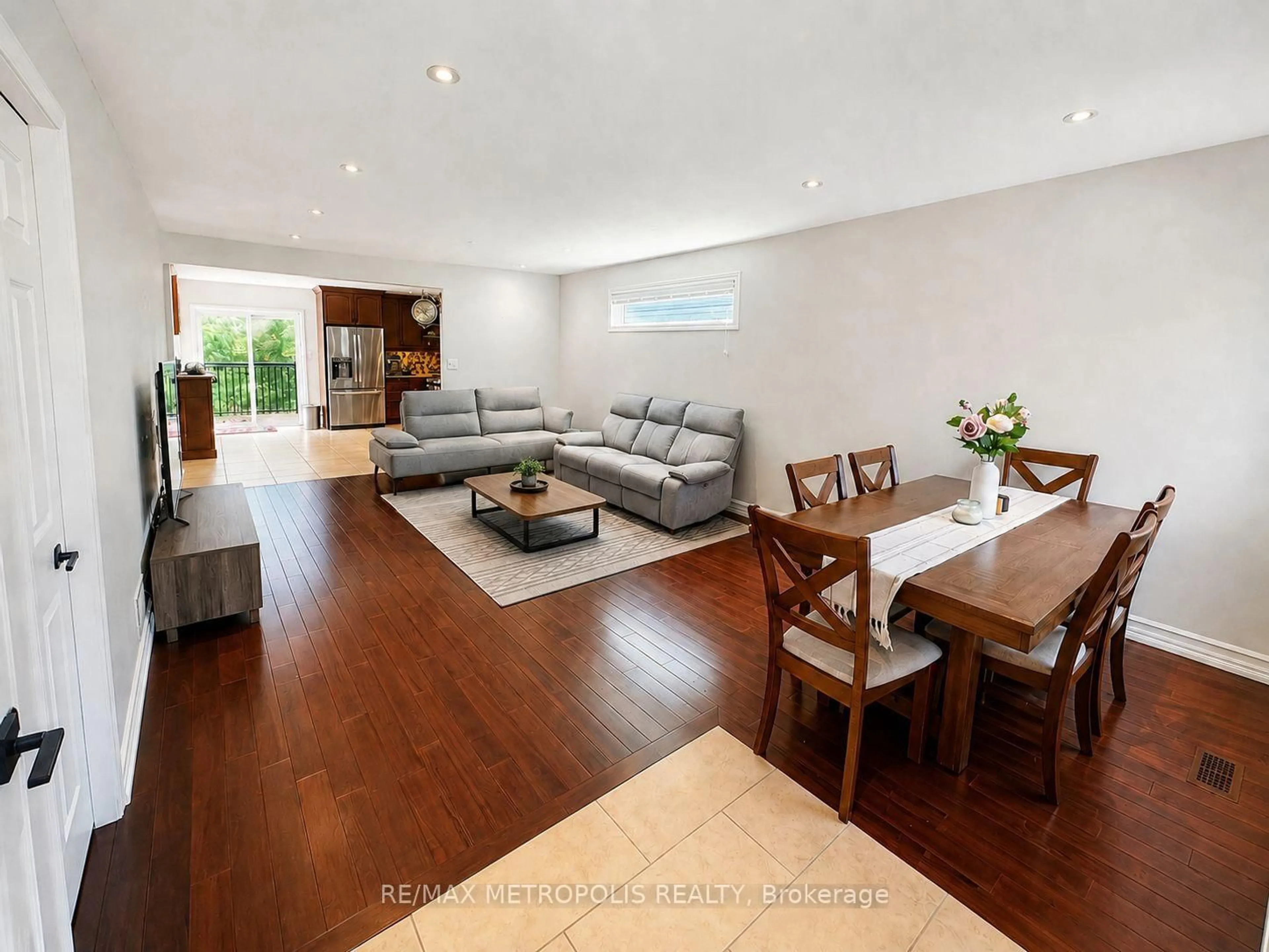 Living room with furniture, wood/laminate floor for 46 Whiterock Ave, Hamilton Ontario L0R 1W0