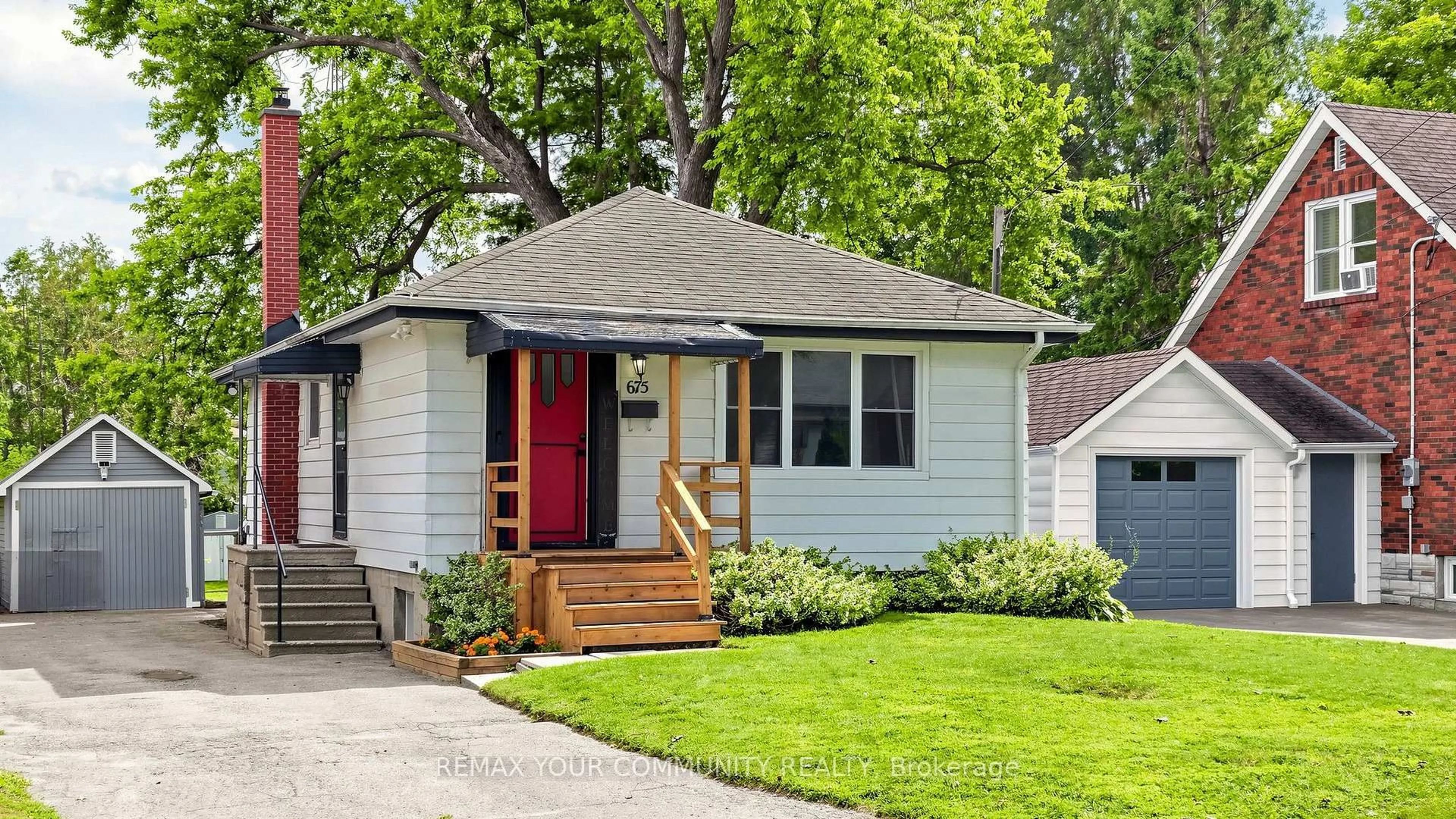 Home with vinyl exterior material, street for 675 Lundys Lane, Peterborough Ontario K9J 4J9