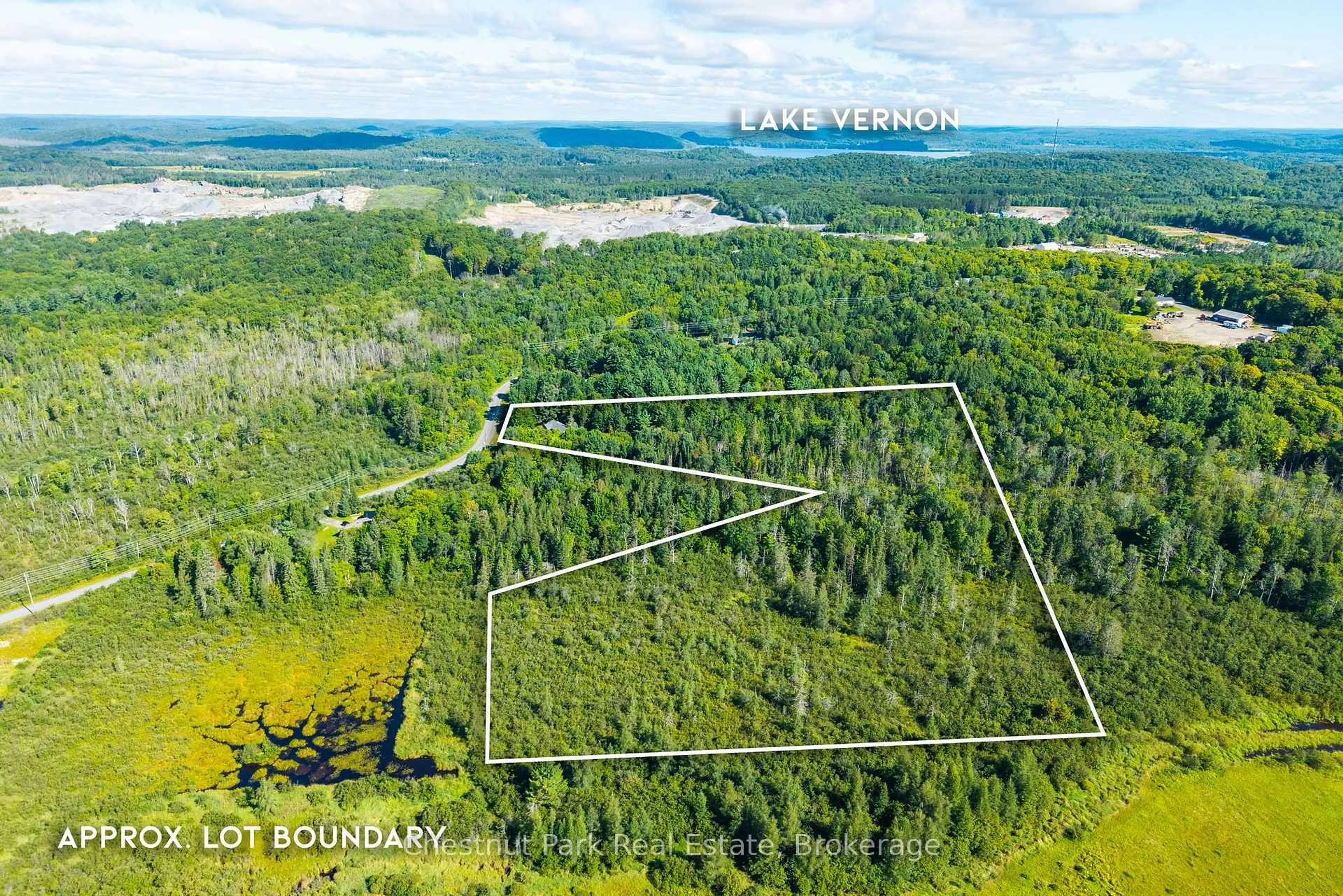 A pic from outside/outdoor area/front of a property/back of a property/a pic from drone, forest/trees view for 521 Old Muskoka Rd, Huntsville Ontario P1H 0G8