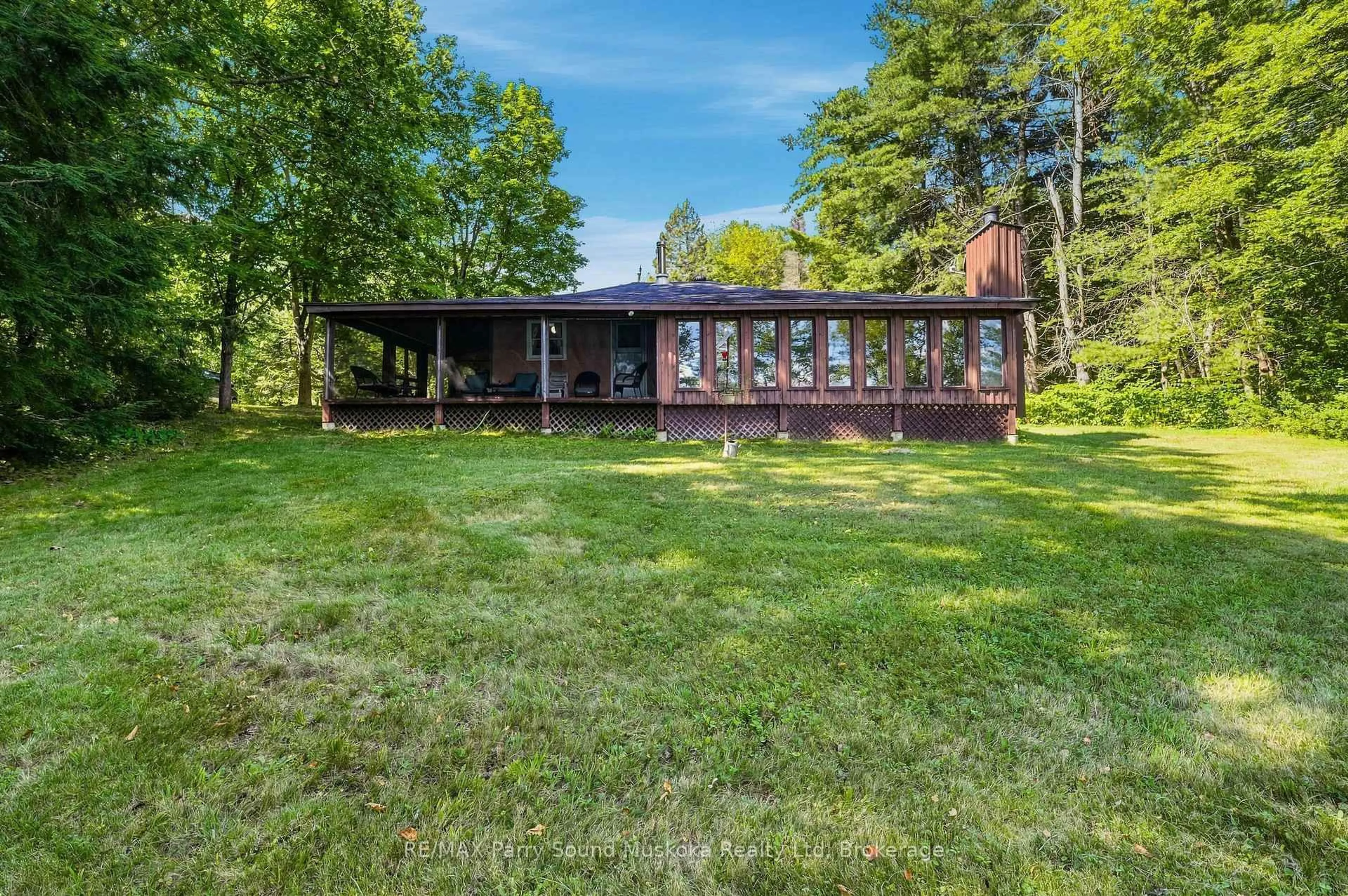 A pic from outside/outdoor area/front of a property/back of a property/a pic from drone, water/lake/river/ocean view for 34 McKechnie Rd, Seguin Ontario P2A 2W8