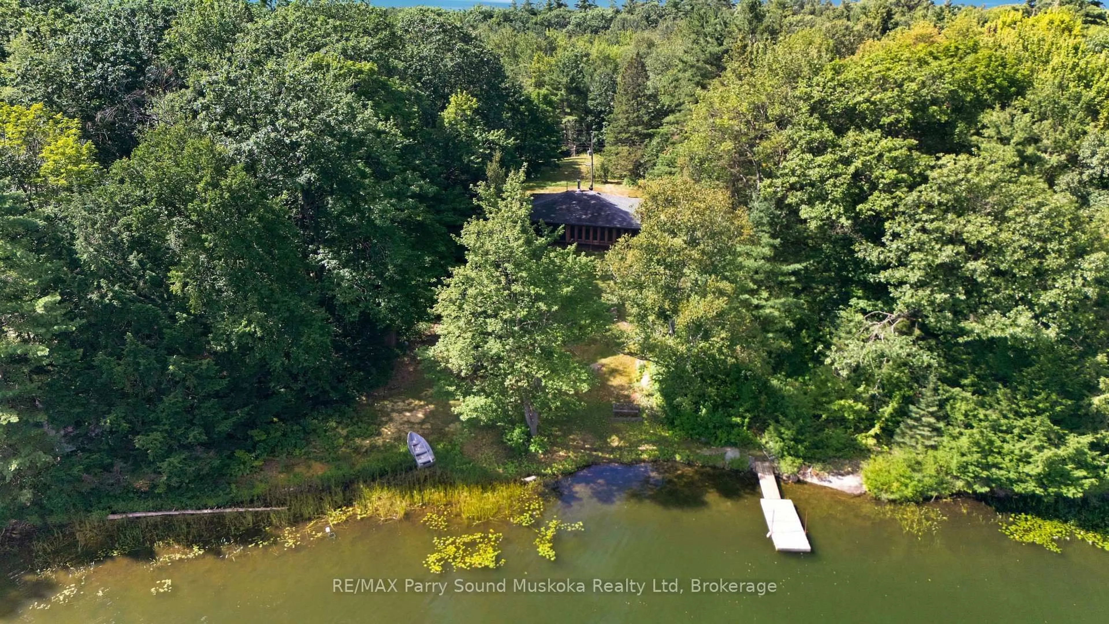 A pic from outside/outdoor area/front of a property/back of a property/a pic from drone, water/lake/river/ocean view for 34 McKechnie Rd, Seguin Ontario P2A 2W8