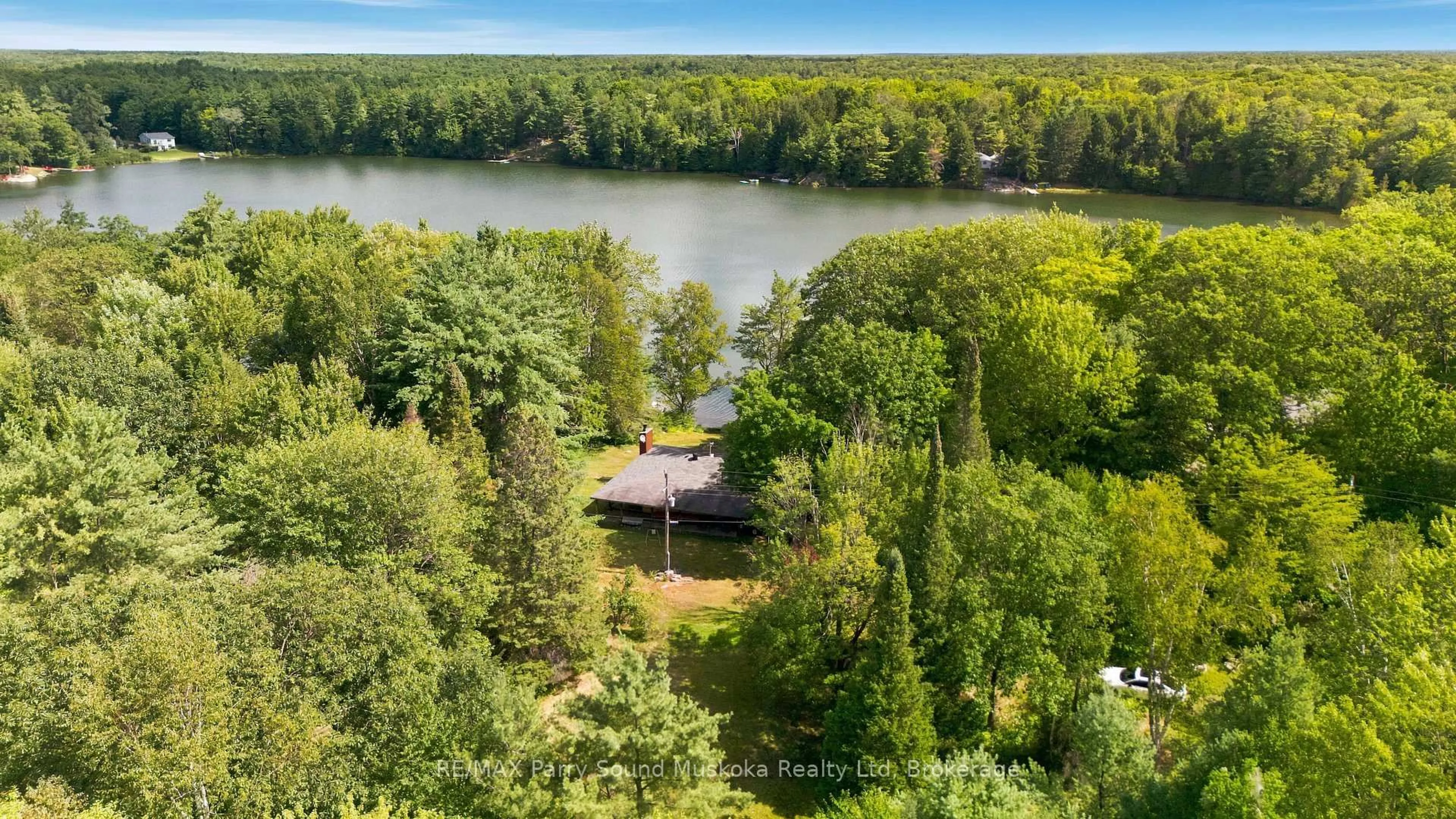 A pic from outside/outdoor area/front of a property/back of a property/a pic from drone, water/lake/river/ocean view for 34 McKechnie Rd, Seguin Ontario P2A 2W8