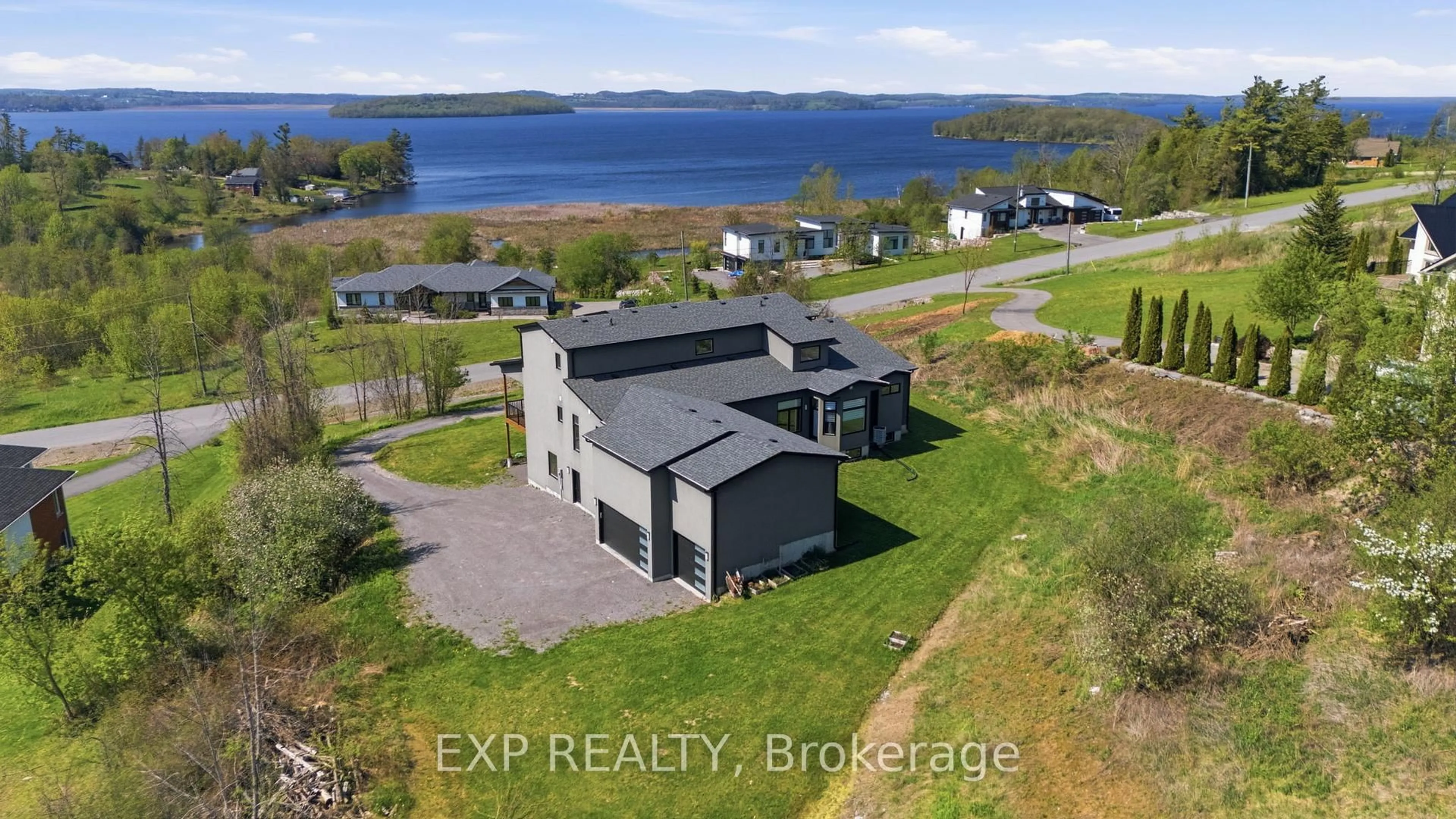 A pic from outside/outdoor area/front of a property/back of a property/a pic from drone, water/lake/river/ocean view for 165 Parkview Dr, Alnwick/Haldimand Ontario K0K 2X0