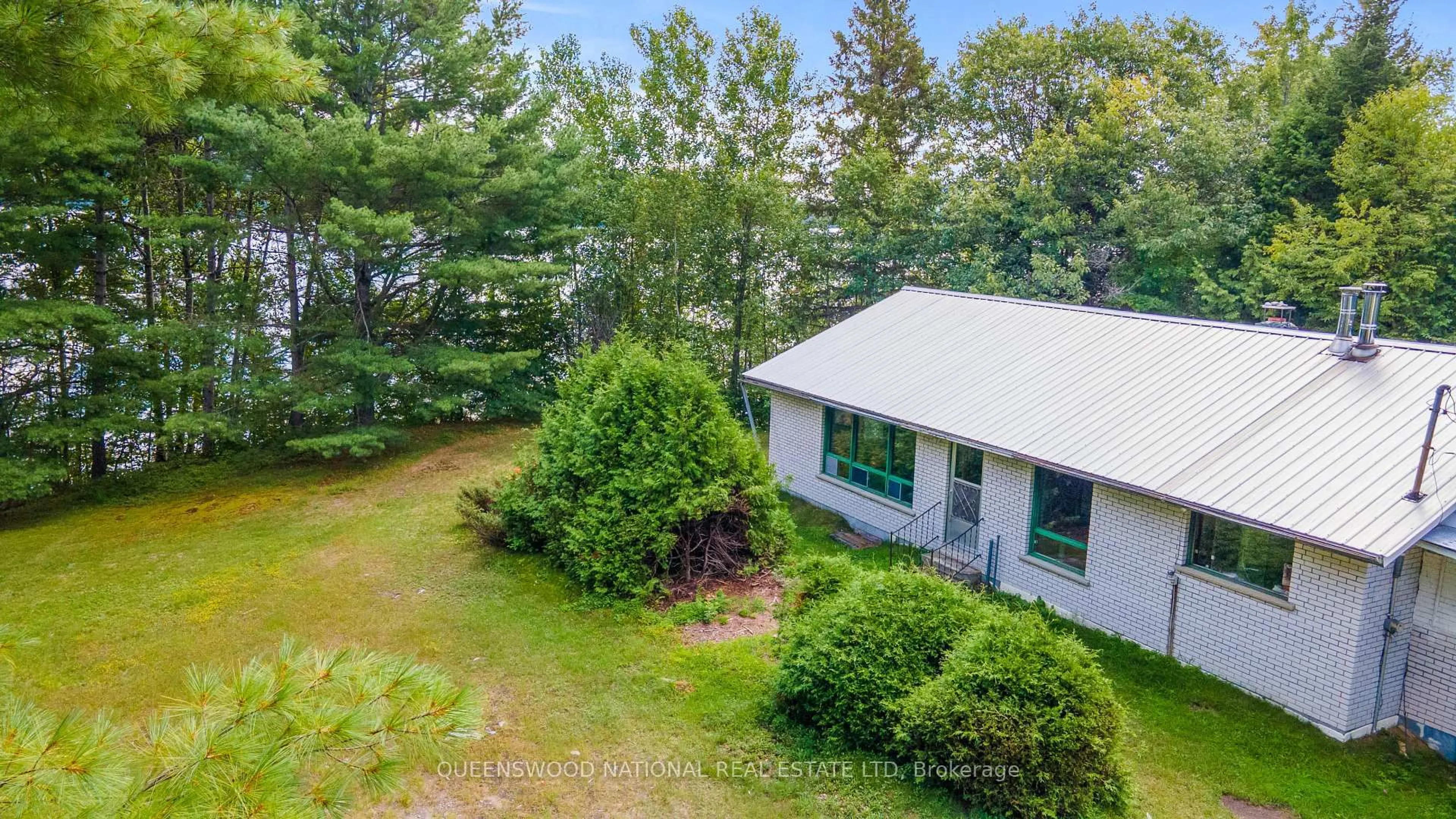 A pic from outside/outdoor area/front of a property/back of a property/a pic from drone, water/lake/river/ocean view for 10A Mcmaster Lake Lane, Barry's Bay Ontario K0J 1B0