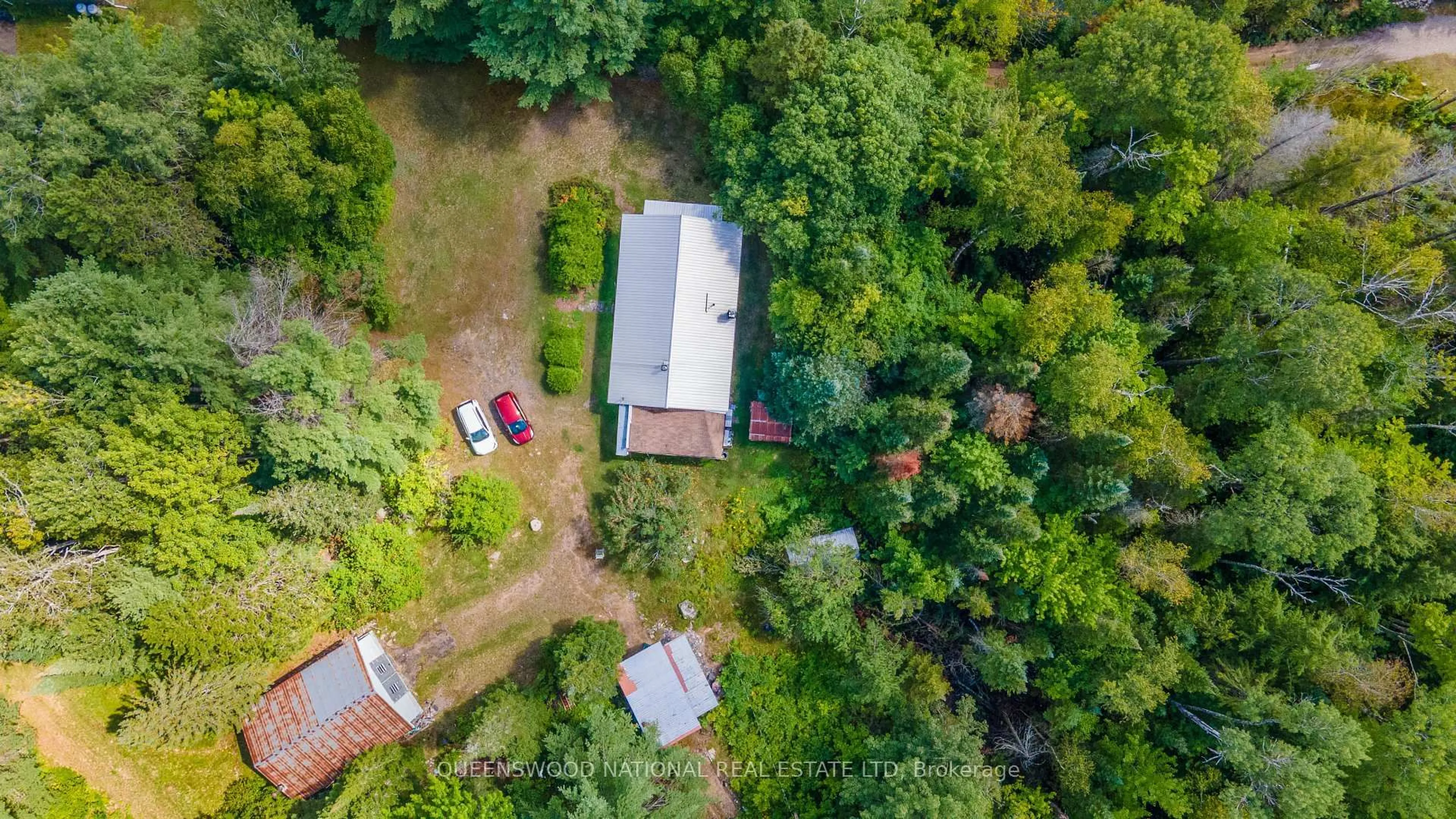 A pic from outside/outdoor area/front of a property/back of a property/a pic from drone, forest/trees view for 10A Mcmaster Lake Lane, Barry's Bay Ontario K0J 1B0