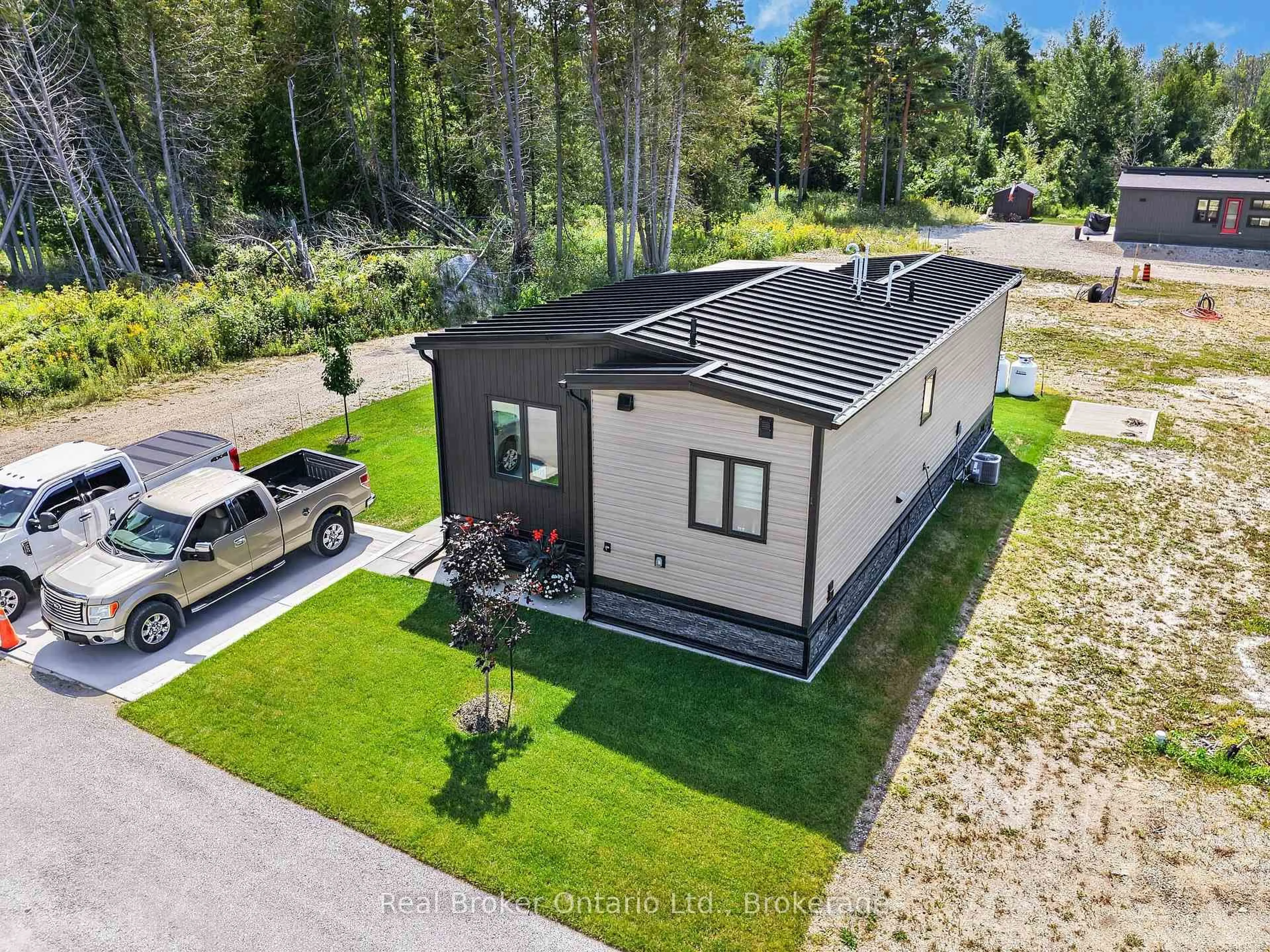 A pic from outside/outdoor area/front of a property/back of a property/a pic from drone, unknown for 5007 Highway 21 Highway #1414, Saugeen Shores Ontario N0H 2C5