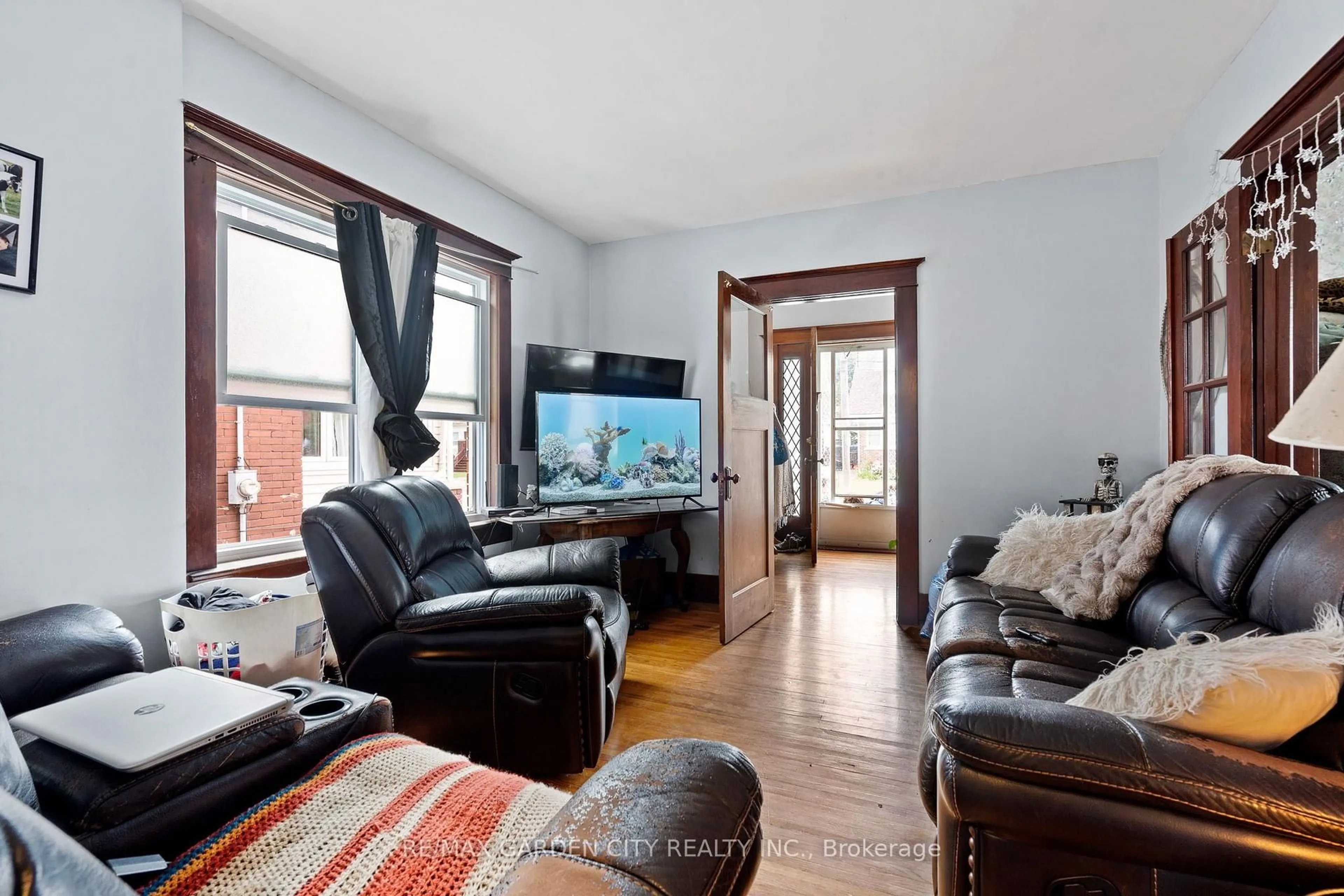 Living room with furniture, unknown for 4842 Fourth Ave, Niagara Falls Ontario L2E 4P1