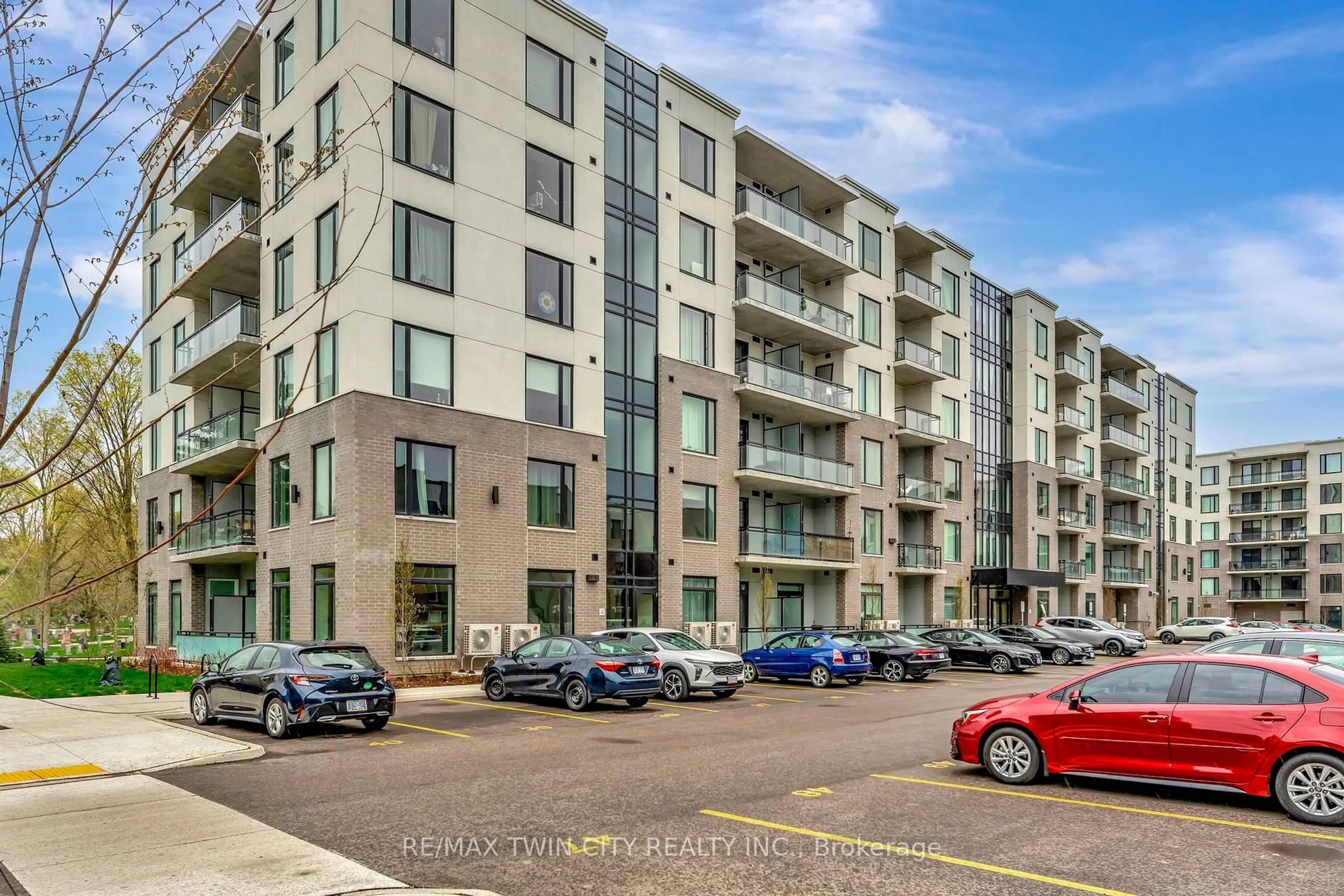 A pic from outside/outdoor area/front of a property/back of a property/a pic from drone, street for 107 Roger St #101, Waterloo Ontario N2J 1A4