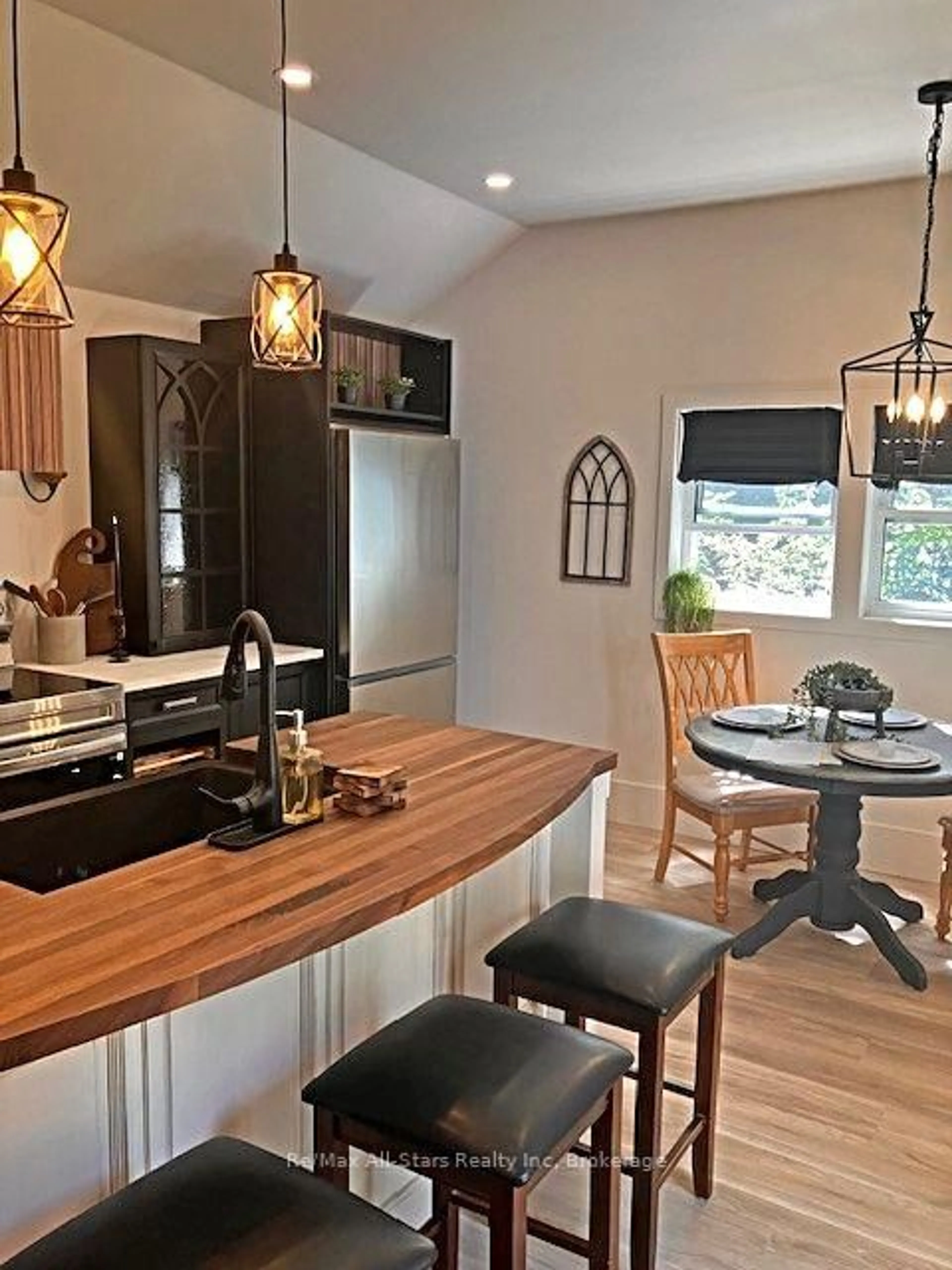 Open concept kitchen, wood/laminate floor for 283 Margaret St, Meaford Ontario N4L 1B5
