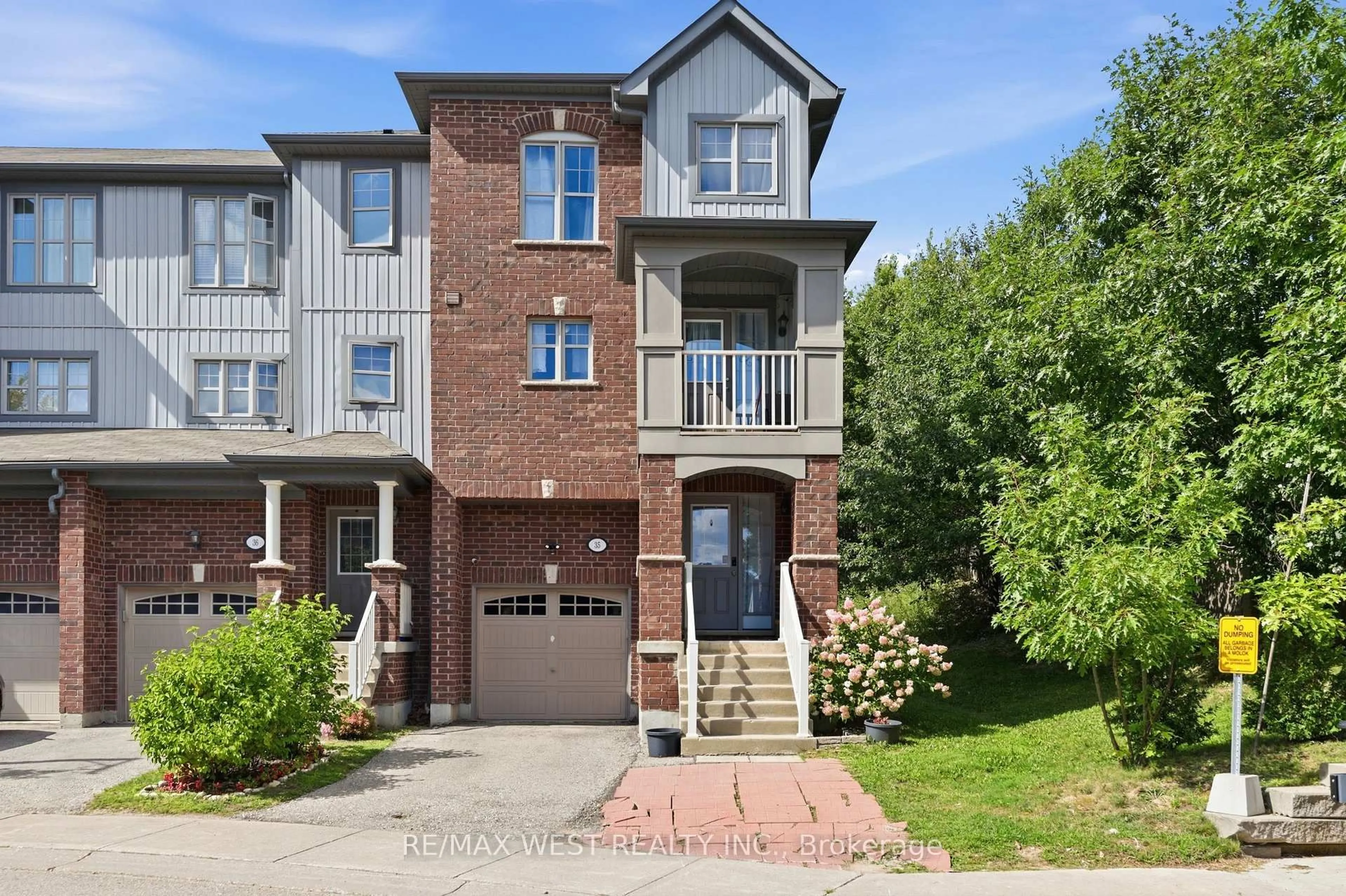 Home with brick exterior material, street for 701 Homer Watson Blvd #35, Kitchener Ontario N2C 0B5