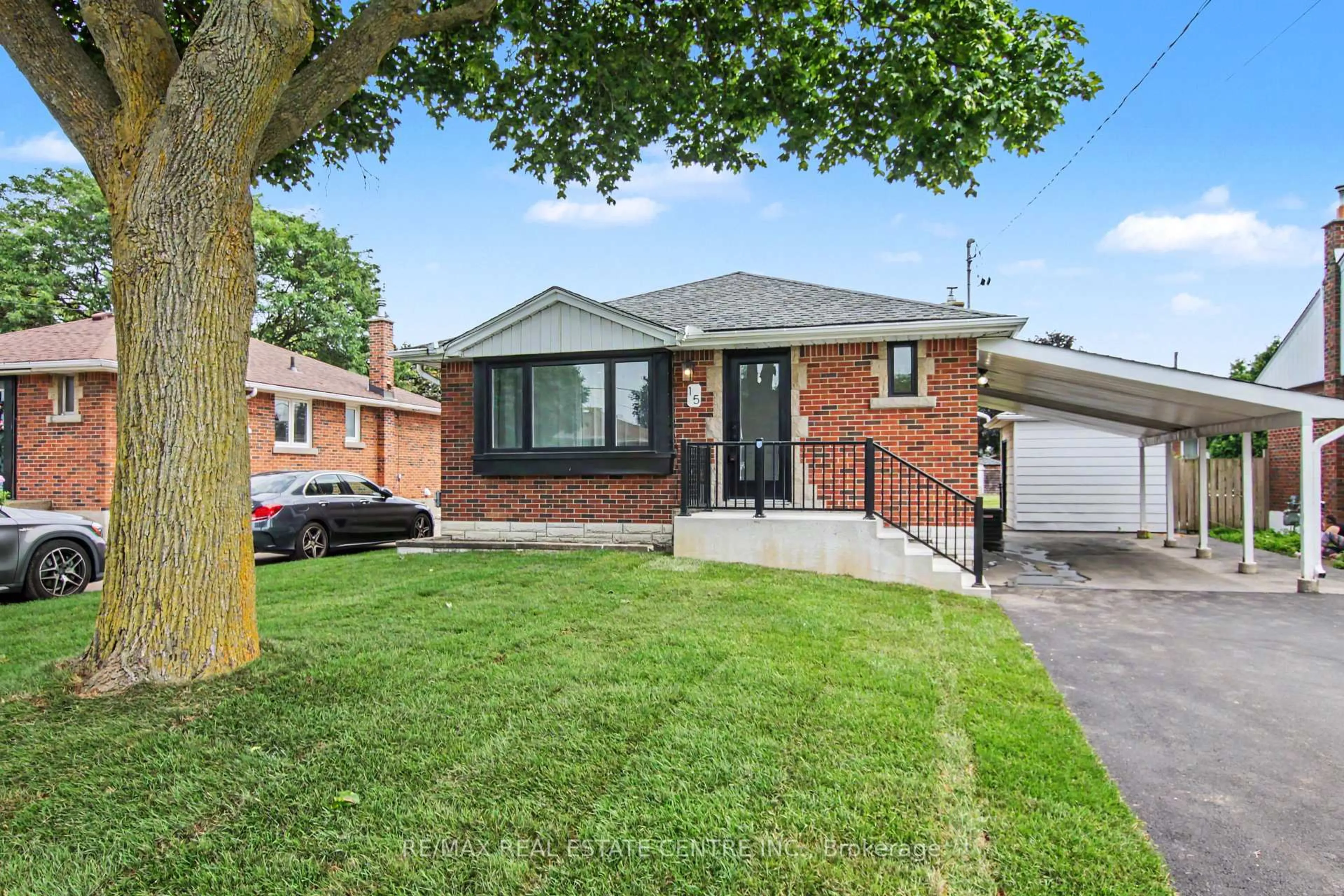 Home with brick exterior material, street for 15 Greenwood St, Hamilton Ontario L8T 3N2