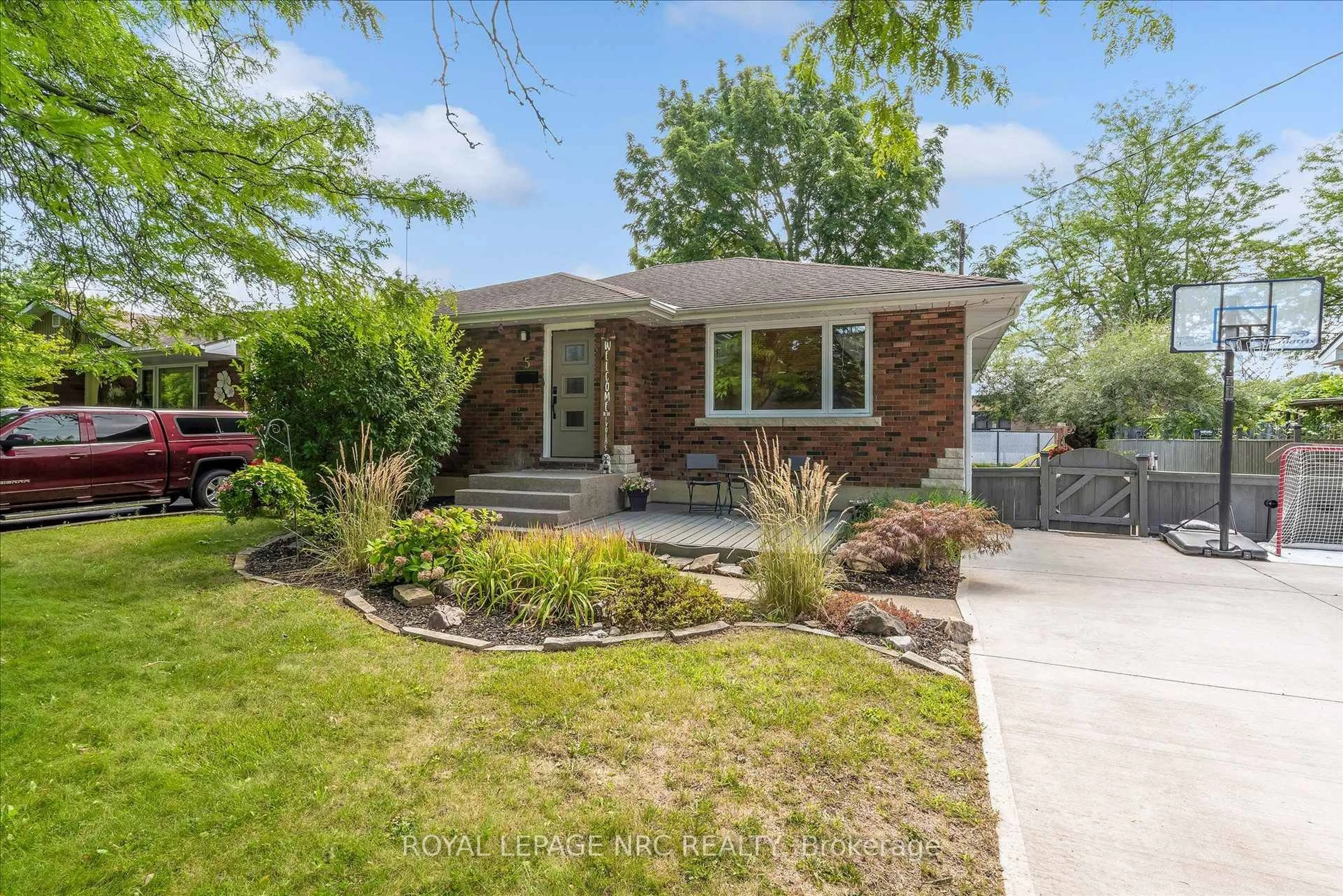 Home with brick exterior material, street for 5 Goldsmith Ave, St. Catharines Ontario L2M 2V7