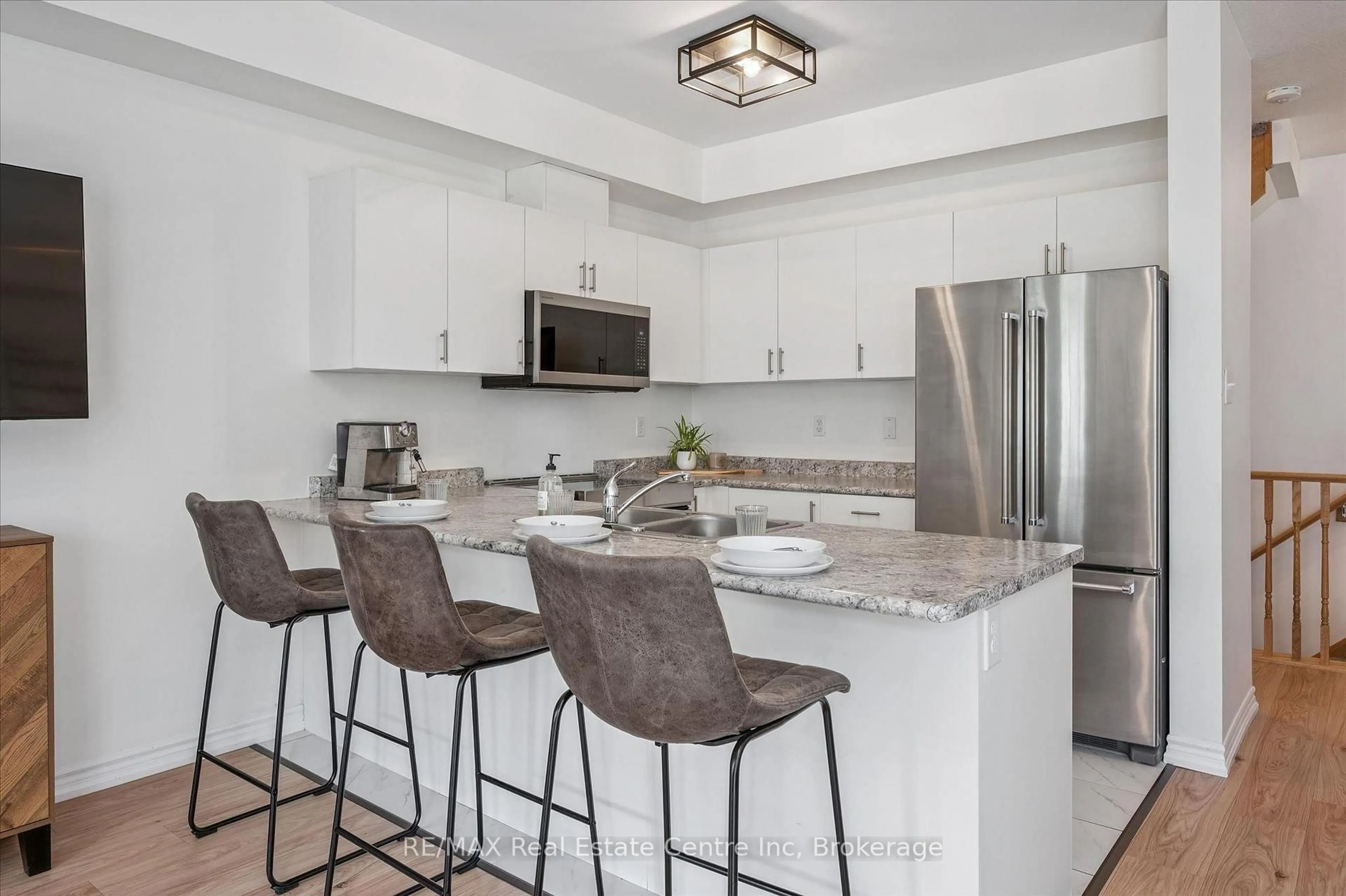 Contemporary kitchen, ceramic/tile floor for 88 DECORSO Dr #30, Guelph Ontario N1L 0A1