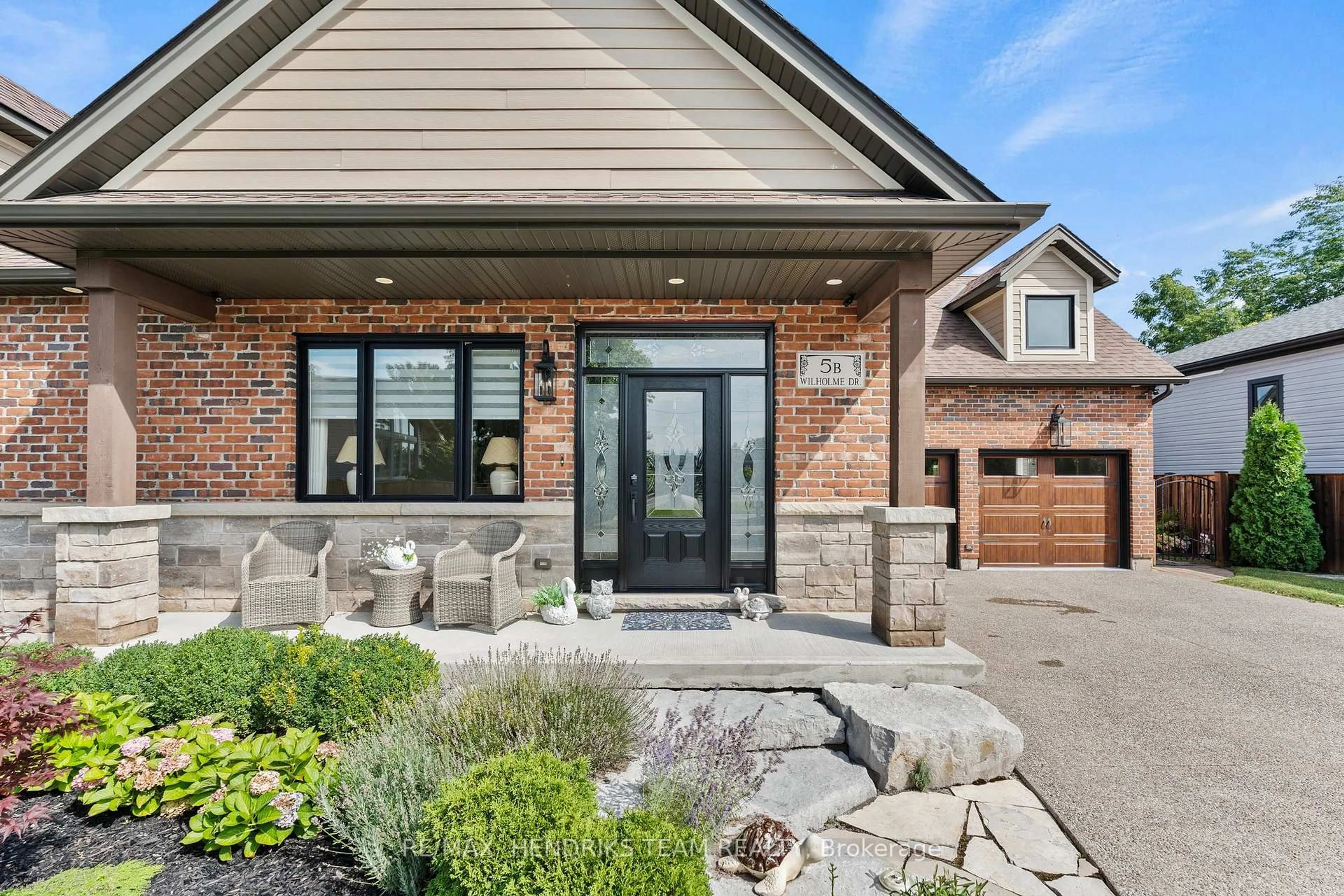 Home with brick exterior material, street for 5B Wilholme Dr, St. Catharines Ontario L2W 1B9