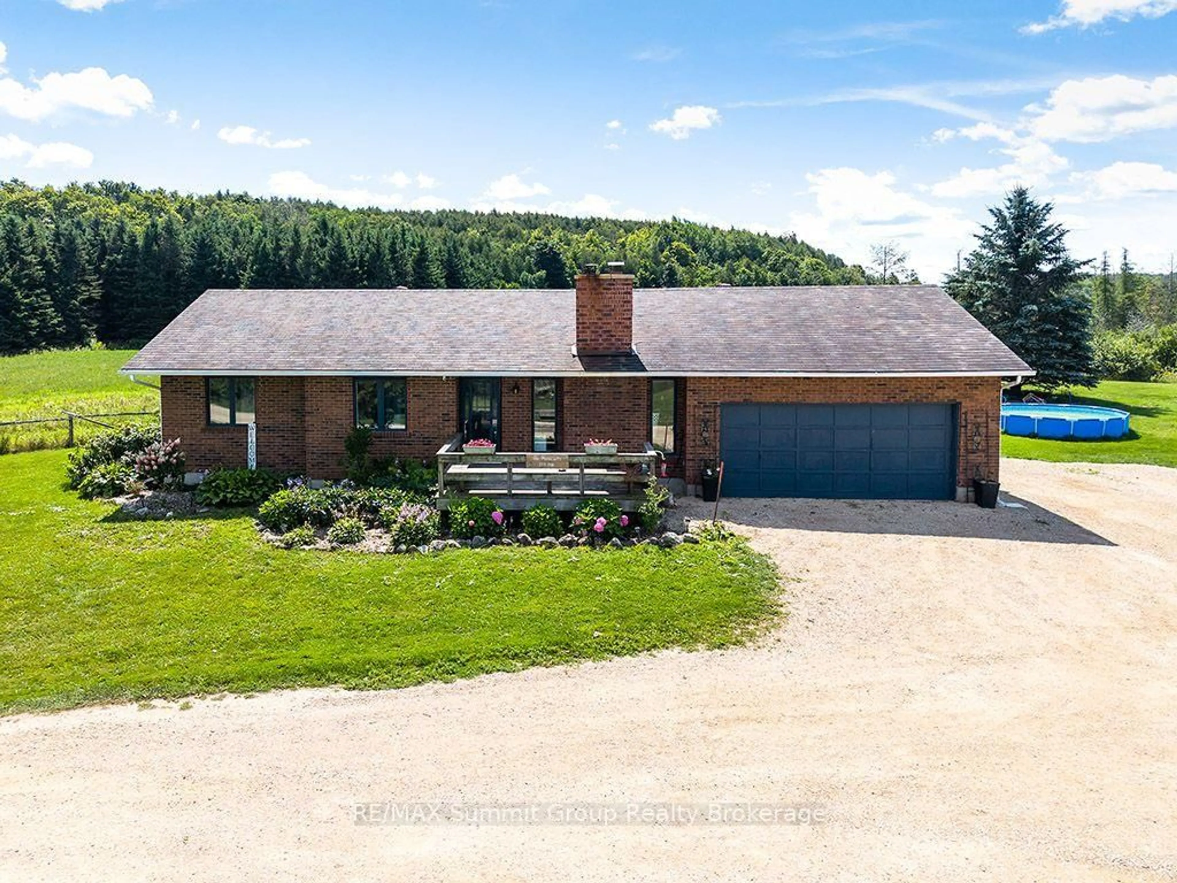 A pic from outside/outdoor area/front of a property/back of a property/a pic from drone, water/lake/river/ocean view for 449686 10th Concession Rd, Grey Highlands Ontario N0C 1M0